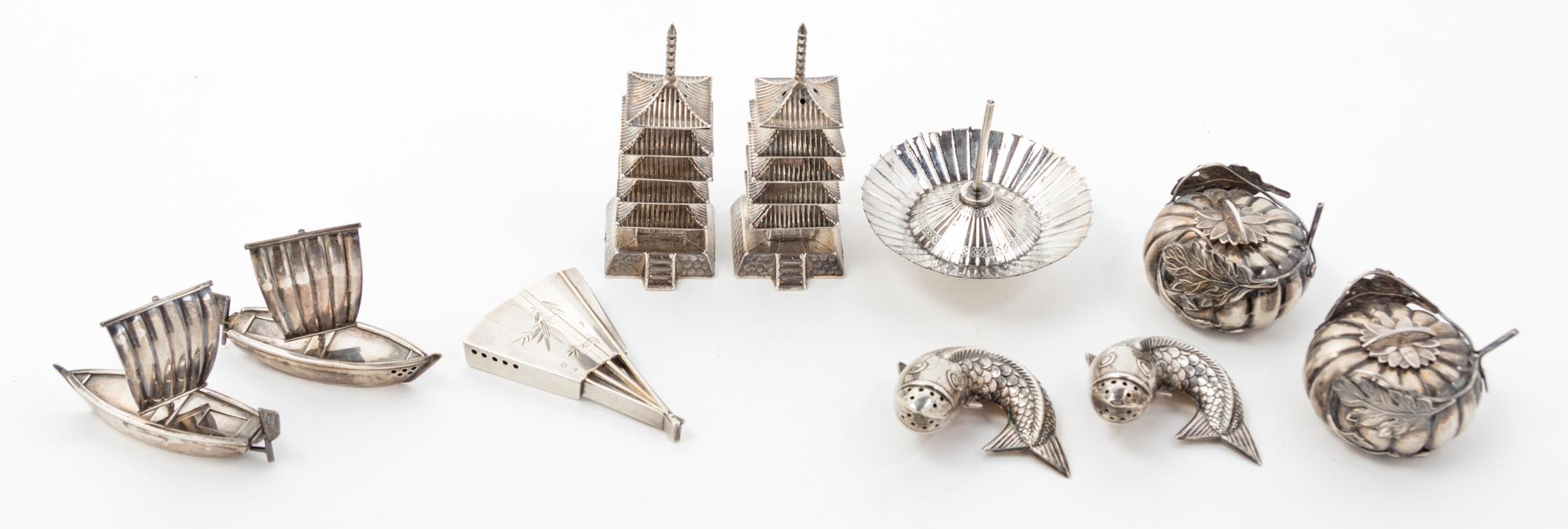 A Group of Ten Asian Themed Silver Casters, , comprising two pagoda towers, two junk boats, two koi fish, two chrysanthemum decorated g