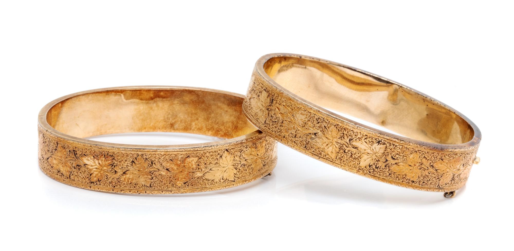 A Pair of Foliate Motif Bangle Bracelets,