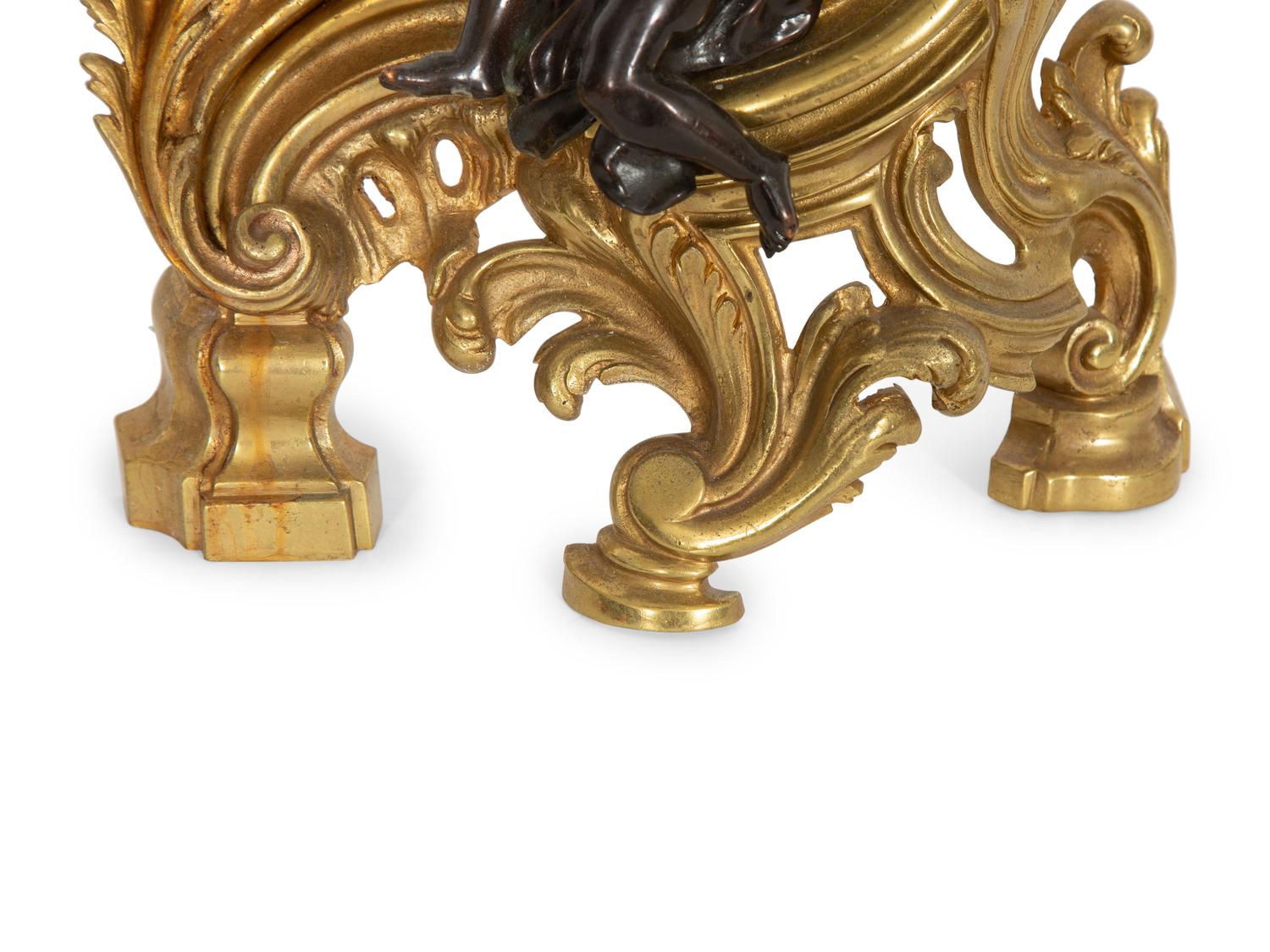 A Pair of Louis XV Style Gilt and Patinated Bronze Chenets
