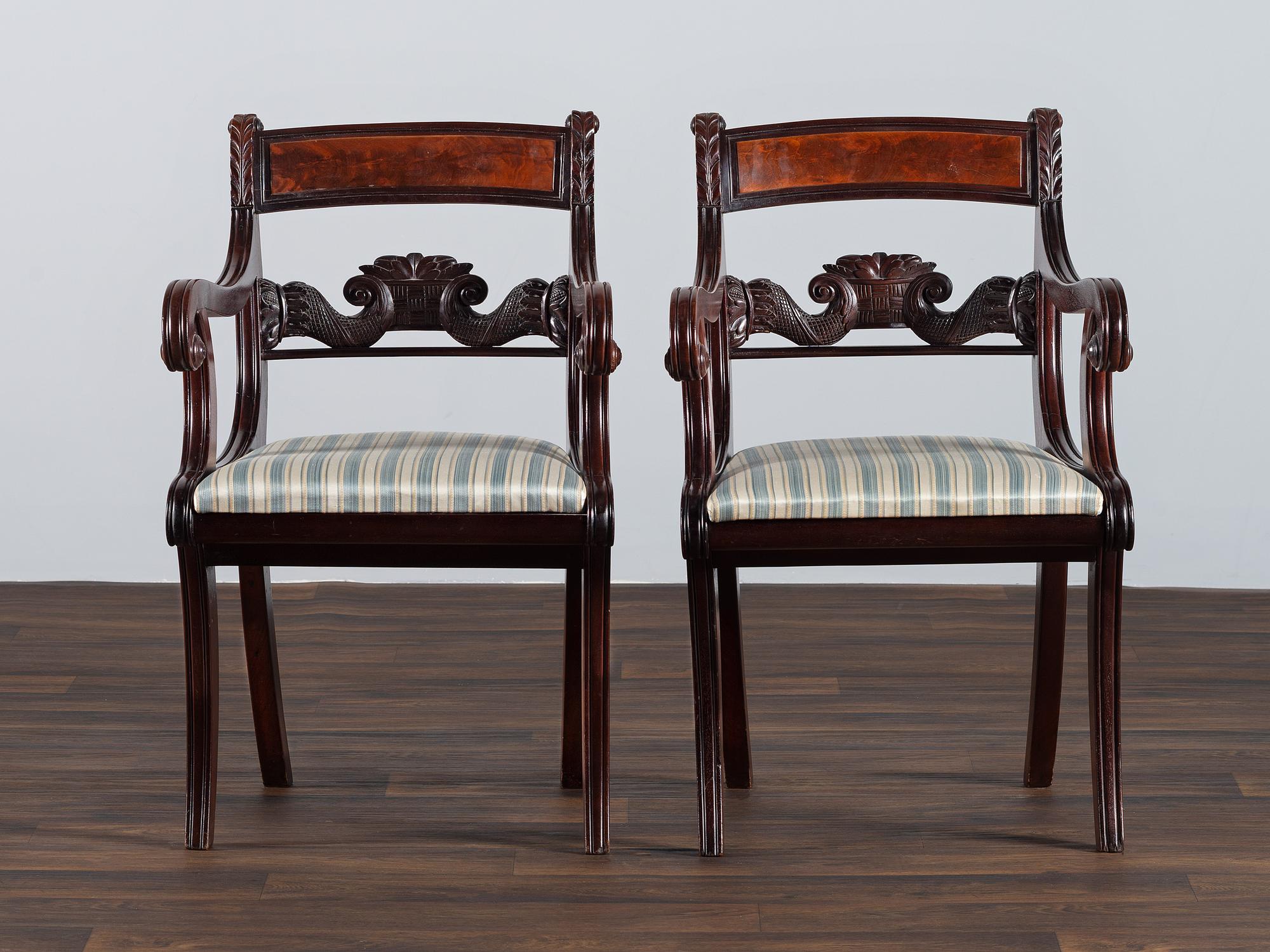 A Pair of Classical Cornucopia Carved Mahogany Armchairs