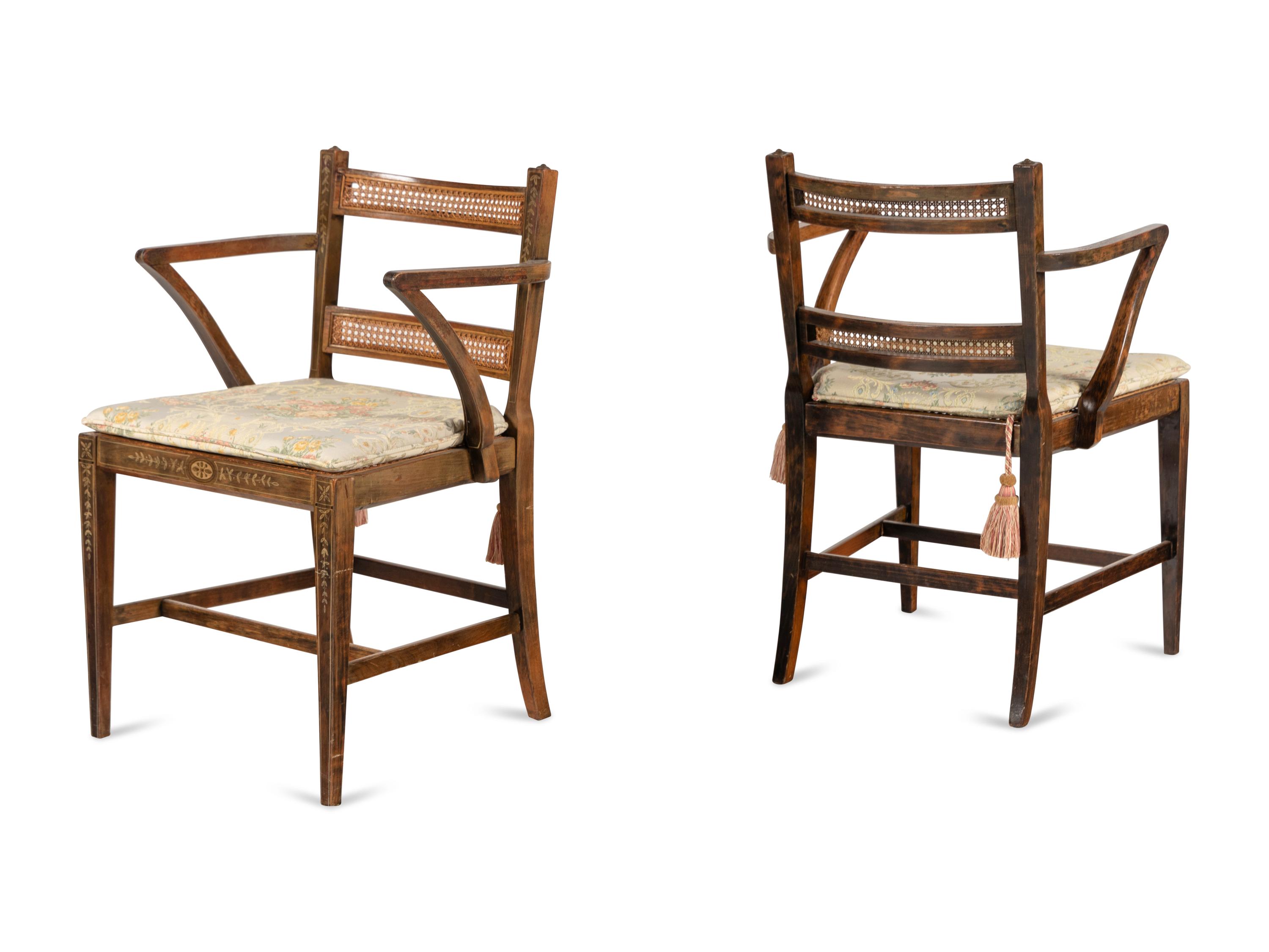 A Pair of Edwardian Painted and Caned Armchairs