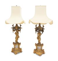 A Pair of French Porcelain Mounted Gilt Bronze Figural Lamps