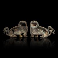 A Pair of Chinese Gilt Bronze Lion Mounts, 17th/18th Century 清中期 鎏金銅獅一對