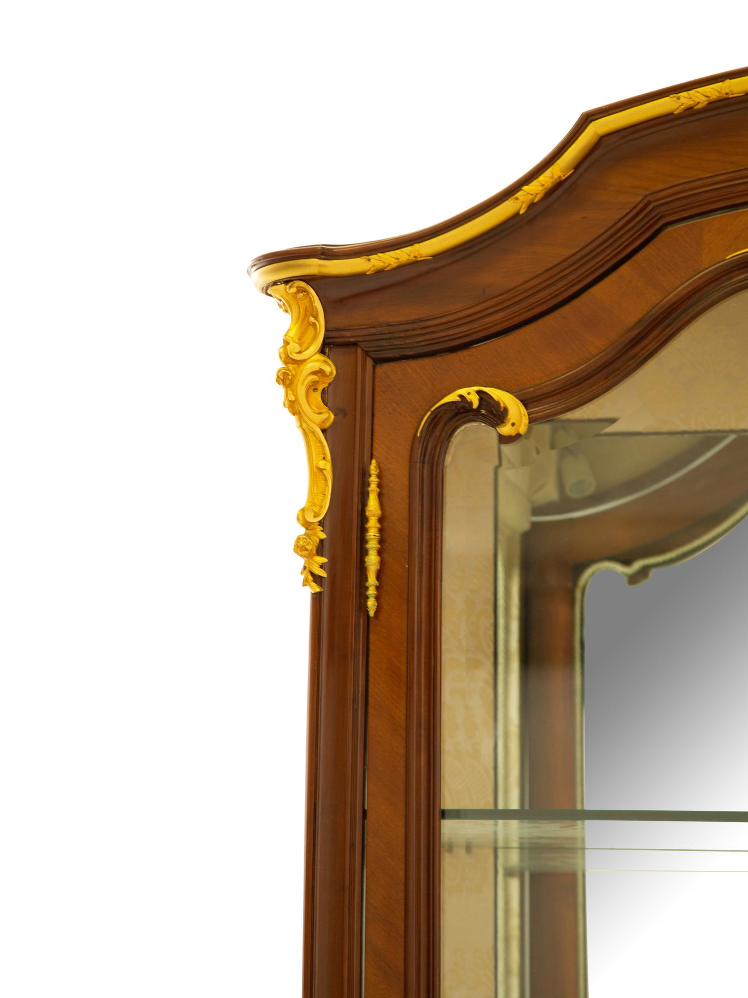 A Louis XV Style Gilt Bronze Mounted Mahogany Vitrine Cabinet