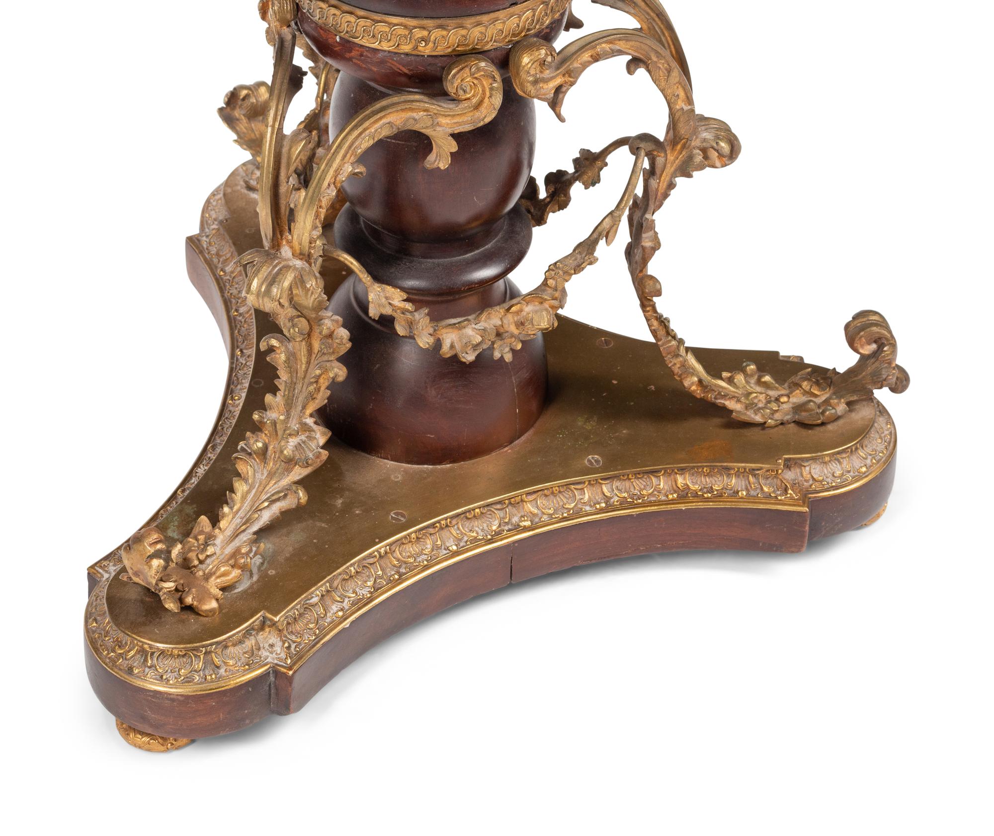 A Louis XVI Style Gilt Bronze and Porcelain Mounted Guéridon