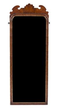 A Georgian Walnut and Parcel Gilt Mirror Height 42 1/2 inches. — 18TH/19TH CENTURY