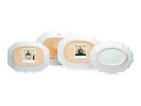 Four Chinese Export Porcelain Armorial Trays