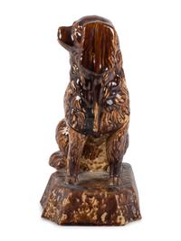 A Rockingham Glazed Yellowware Spaniel, Probably East Liverpool, Ohio