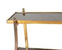 A Pair of Brass Two-Tier Side Tables in the Style of Maison Jansen