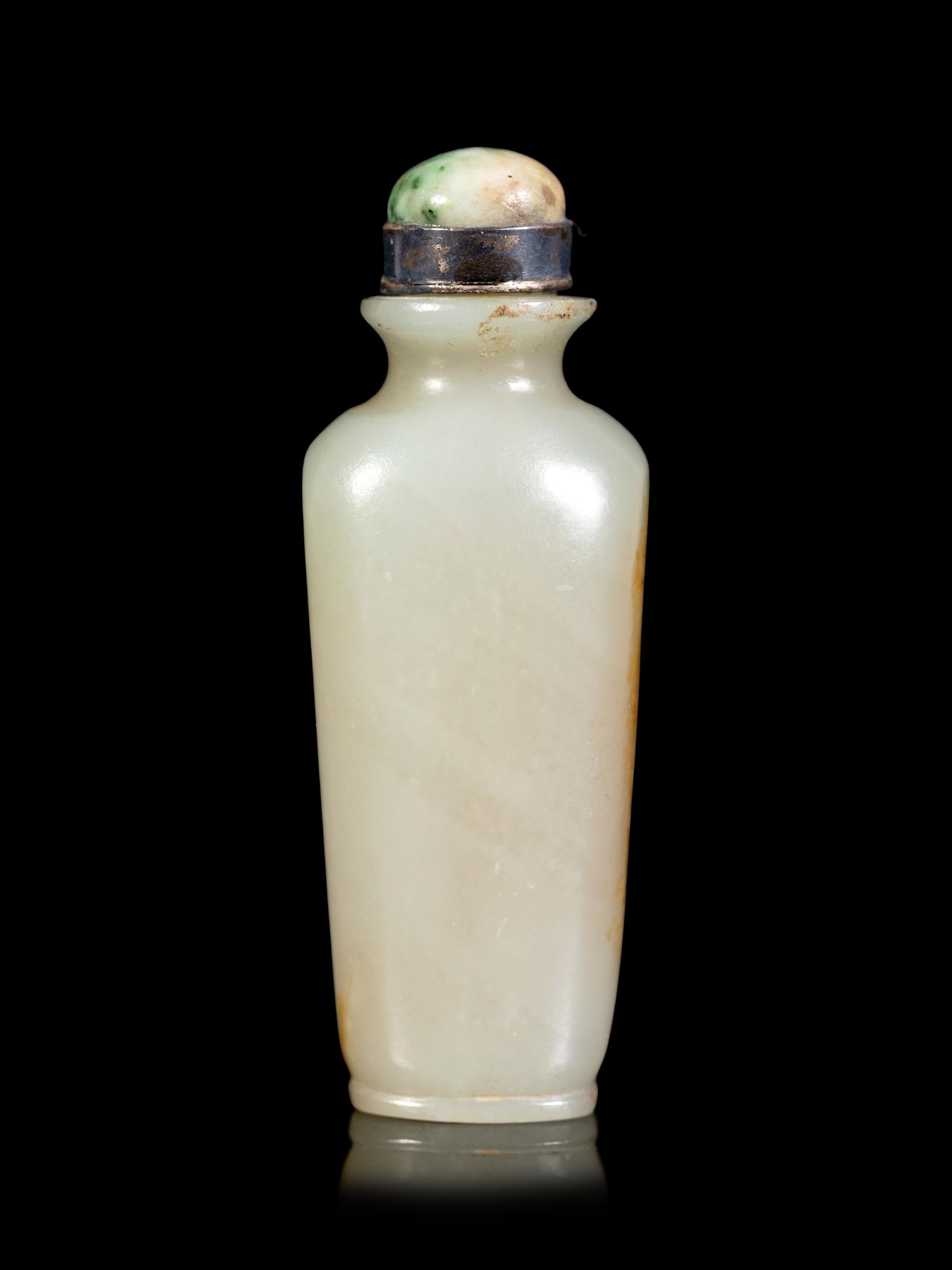 A Celadon and Russet Jade Snuff Bottle
