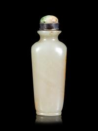 A Celadon and Russet Jade Snuff Bottle