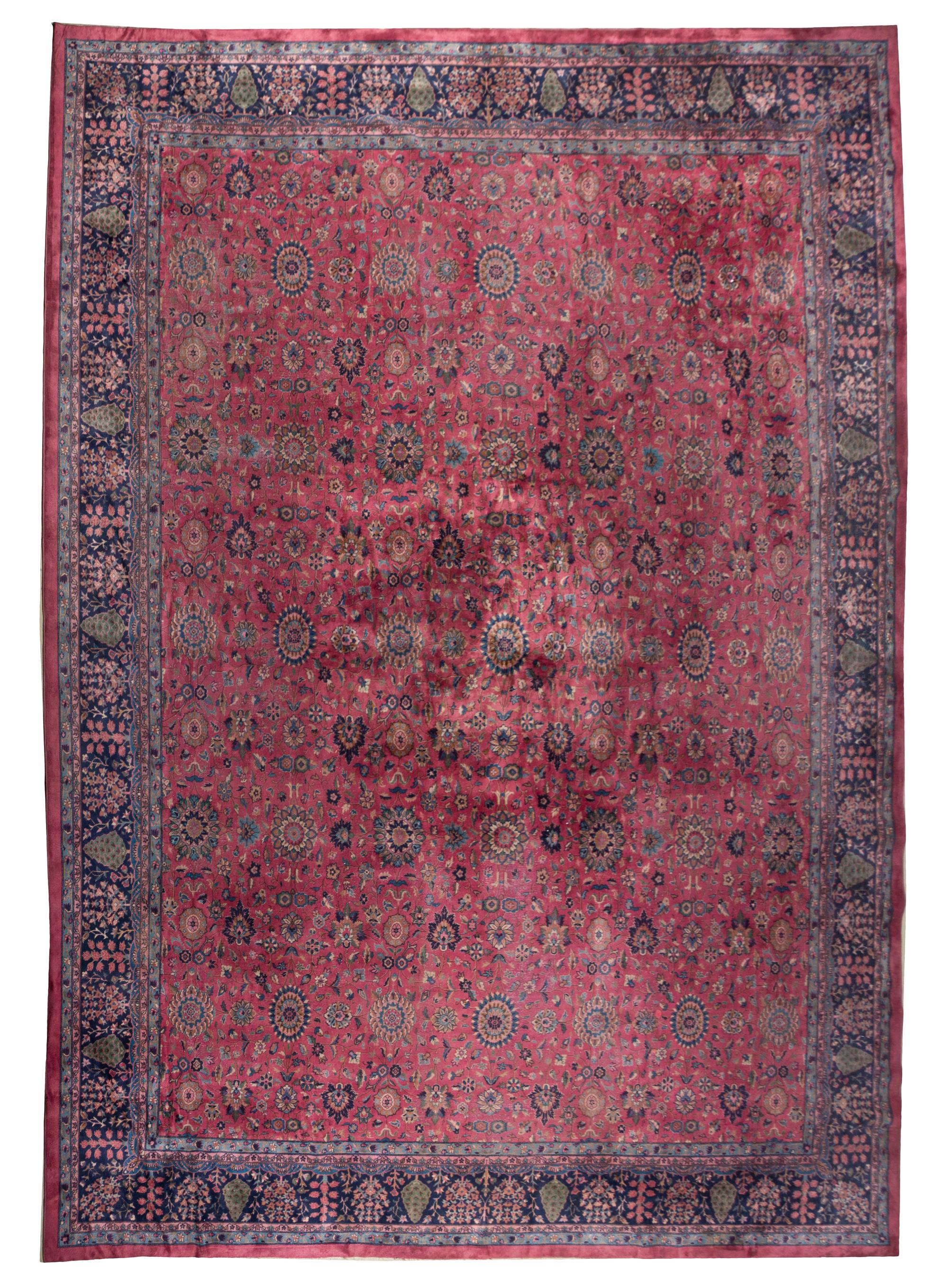 A Persian Wool Rug, 17 feet 8 inches x 14 feet 6 inches.