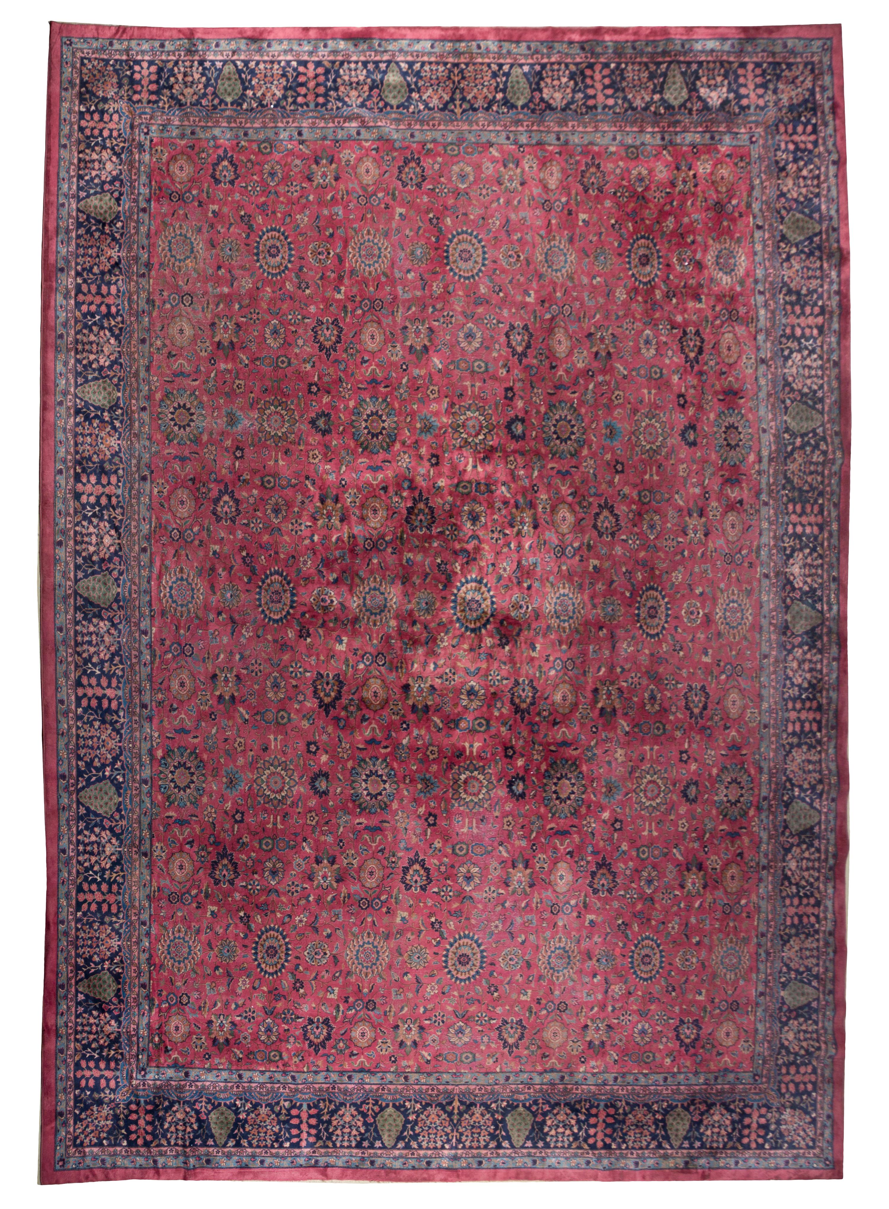 A Persian Wool Rug, 17 feet 8 inches x 14 feet 6 inches.