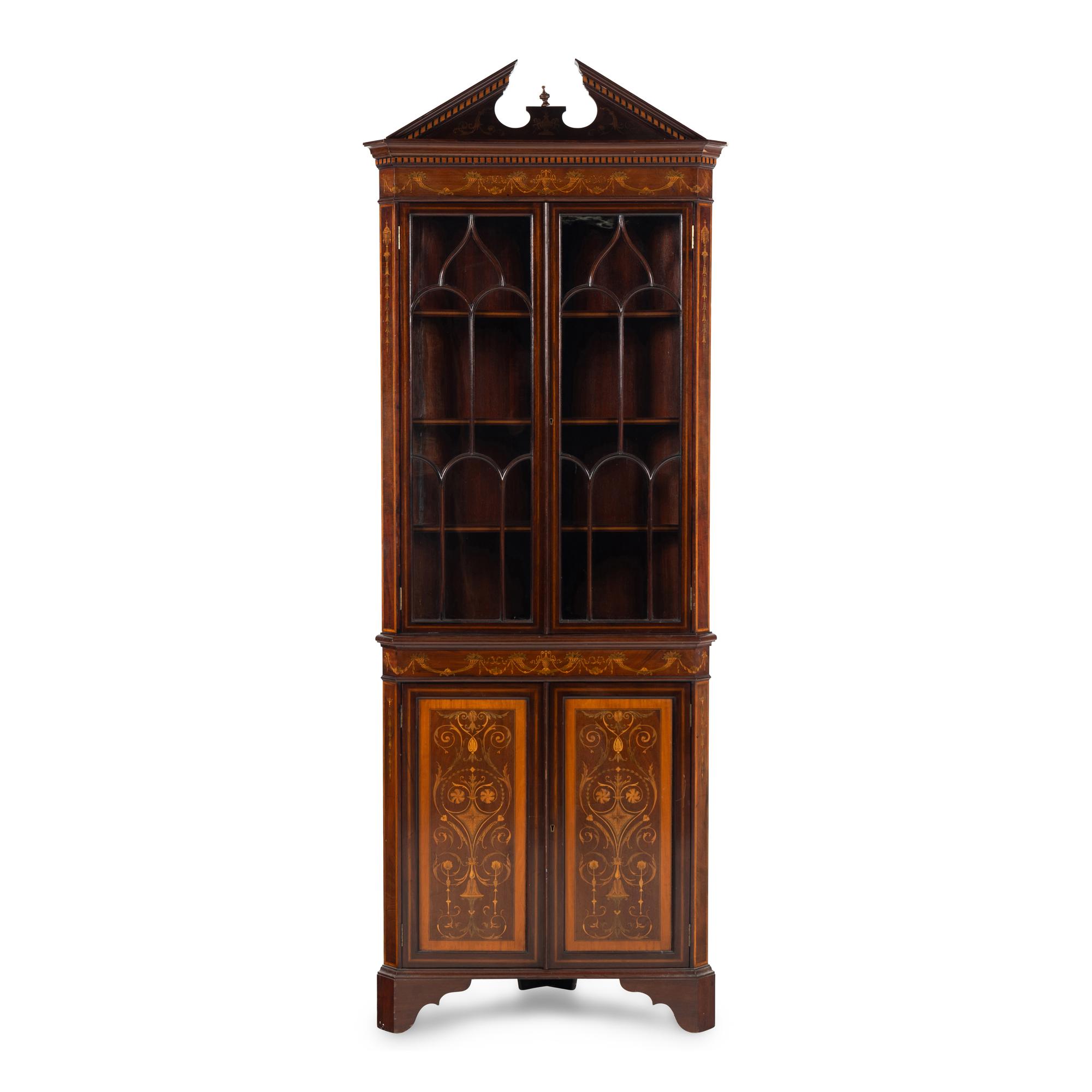 An Edwardian Fruitwood- Inlaid Mahogany Corner Cupboard