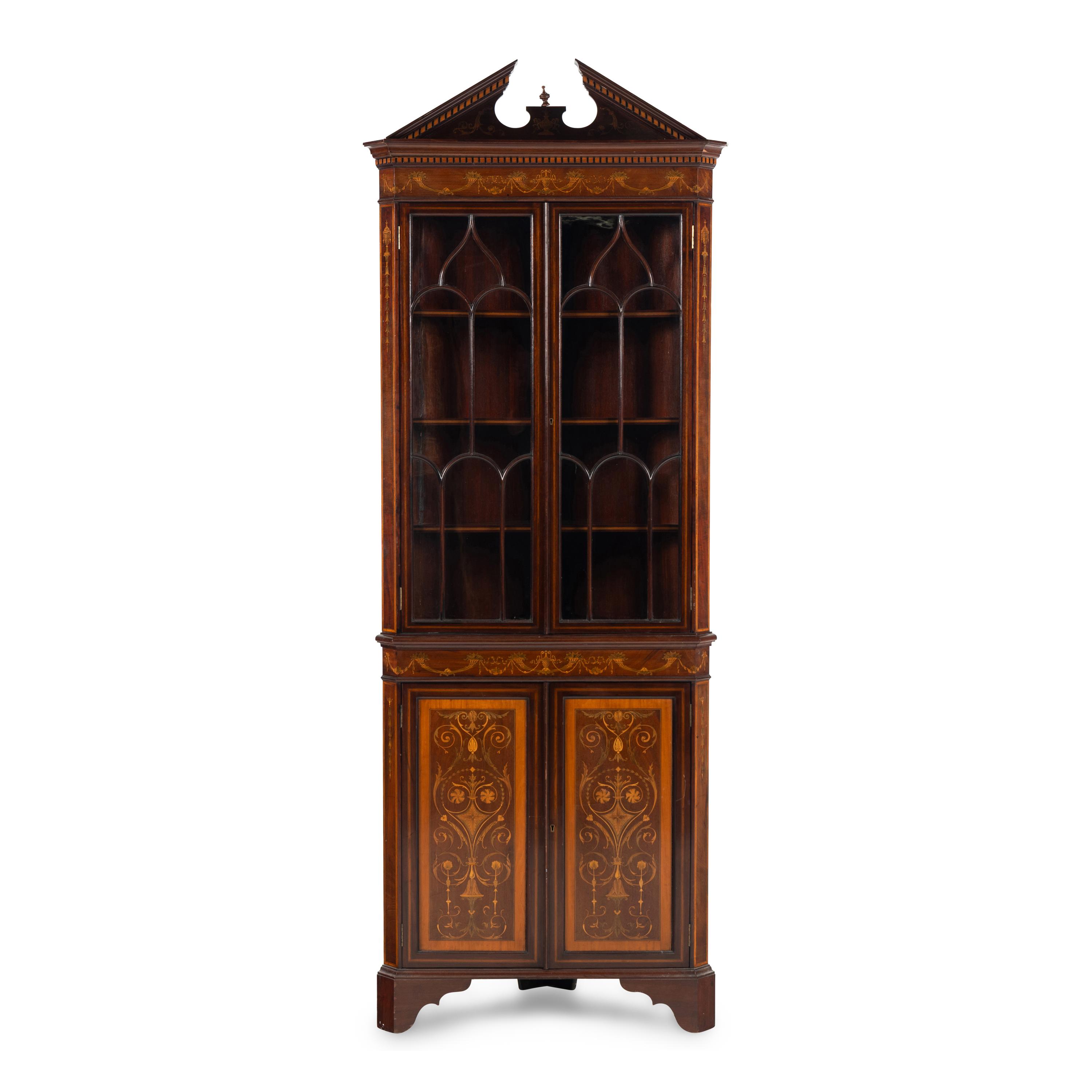An Edwardian Fruitwood- Inlaid Mahogany Corner Cupboard