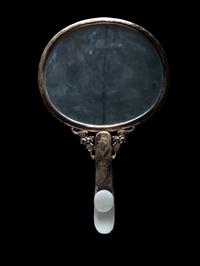 A White Jade Mounted and Hardstone Embellished Hand Mirror