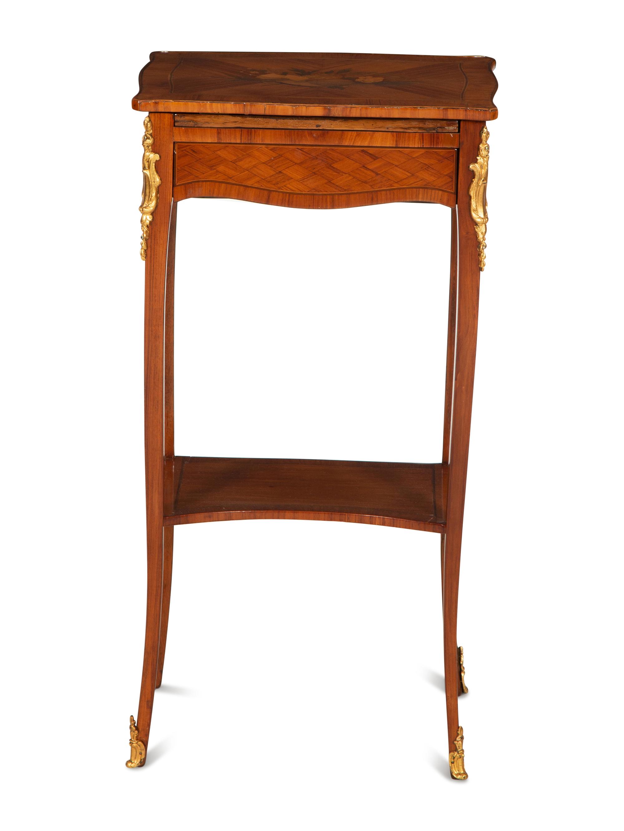 A Louis XV/XVI Transitional Gilt Bronze Mounted Marquetry Library Table