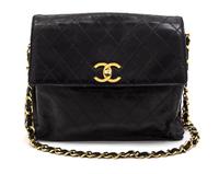 A Chanel Black Quilted Leather Flap Bag, 10 1/2 x 8 1/2 x 2 inches.