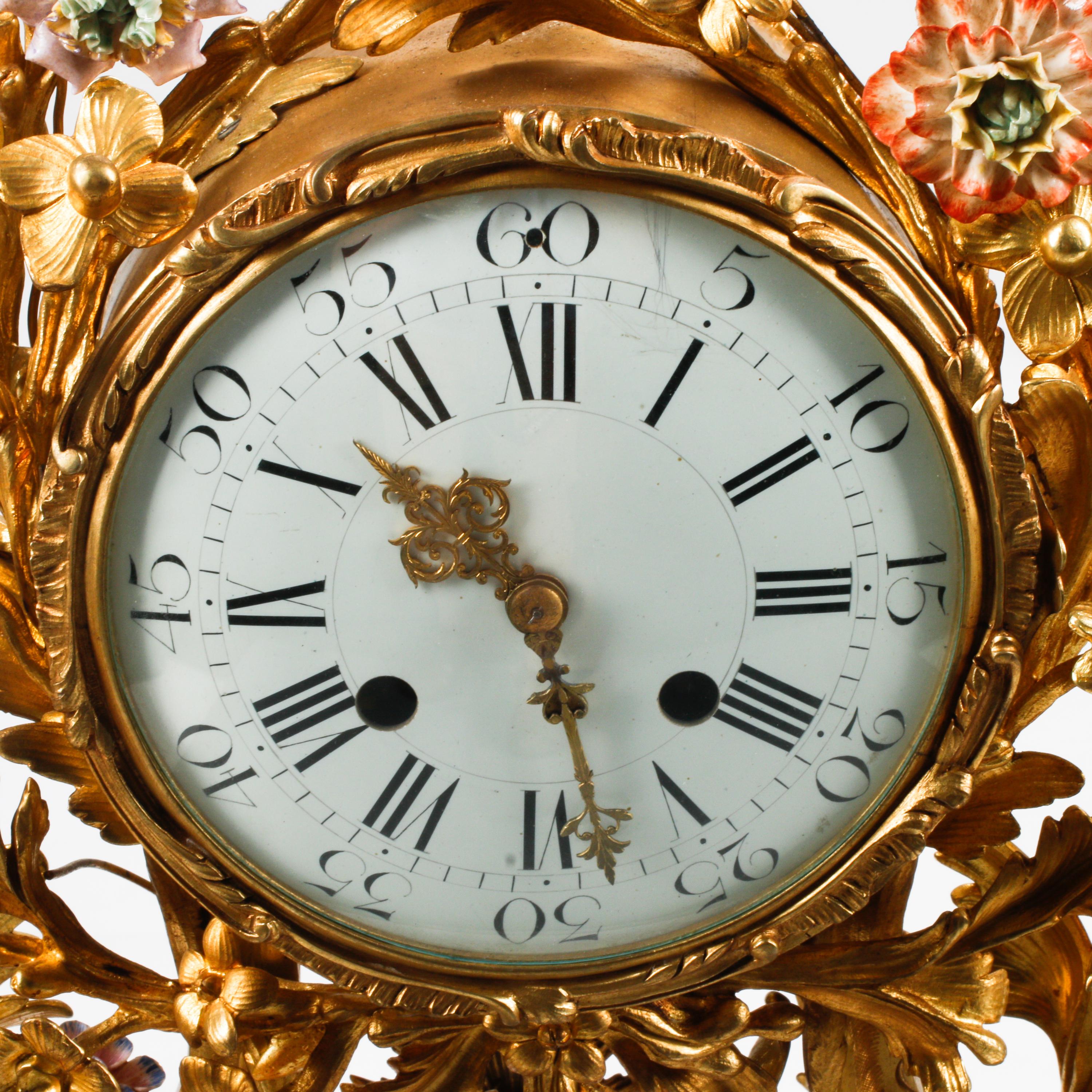 A Large Louis XV Style Gilt Bronze and Porcelain Mounted Clock