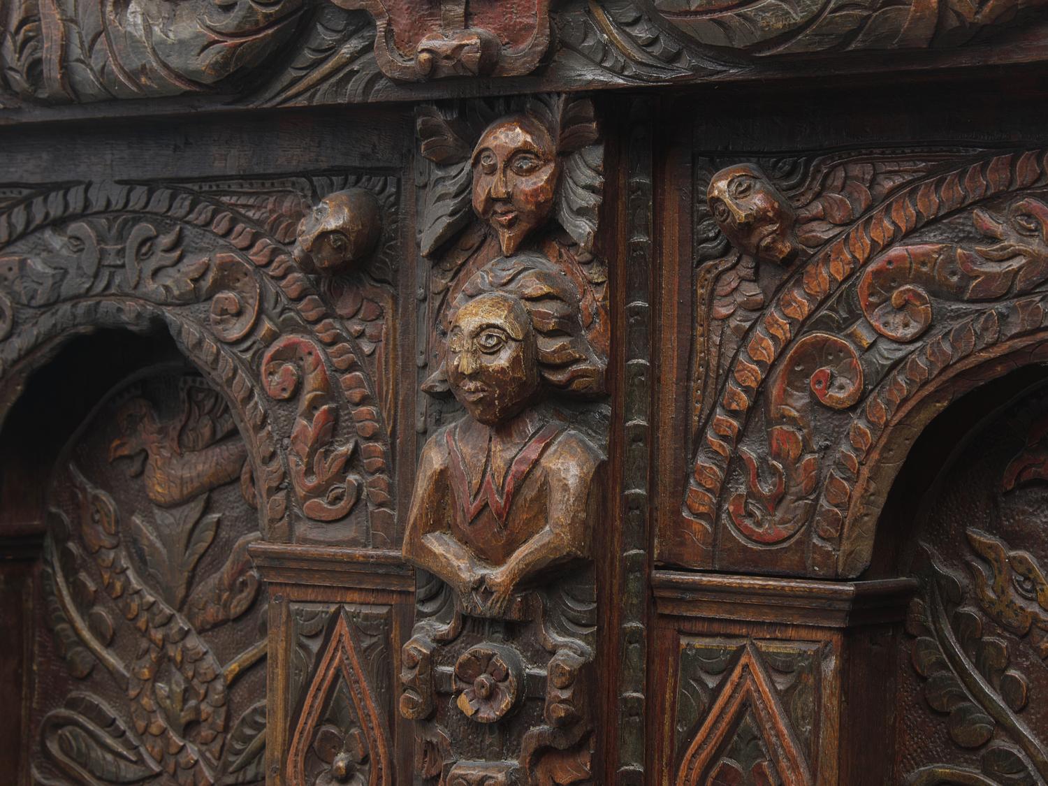 A Charles II Carved Oak and Polychrome Decorated Panel