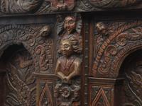 A Charles II Carved Oak and Polychrome Decorated Panel