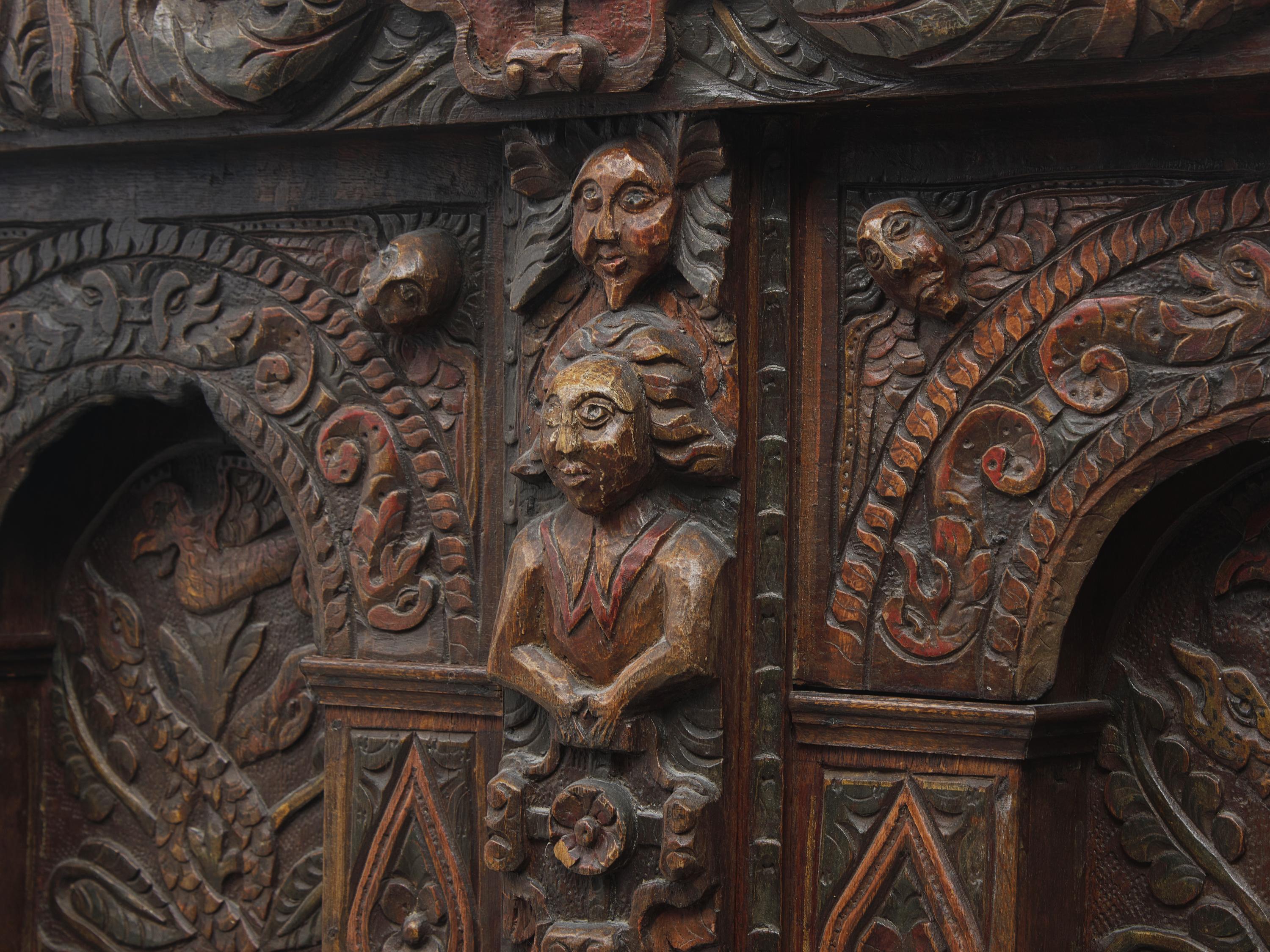 A Charles II Carved Oak and Polychrome Decorated Panel