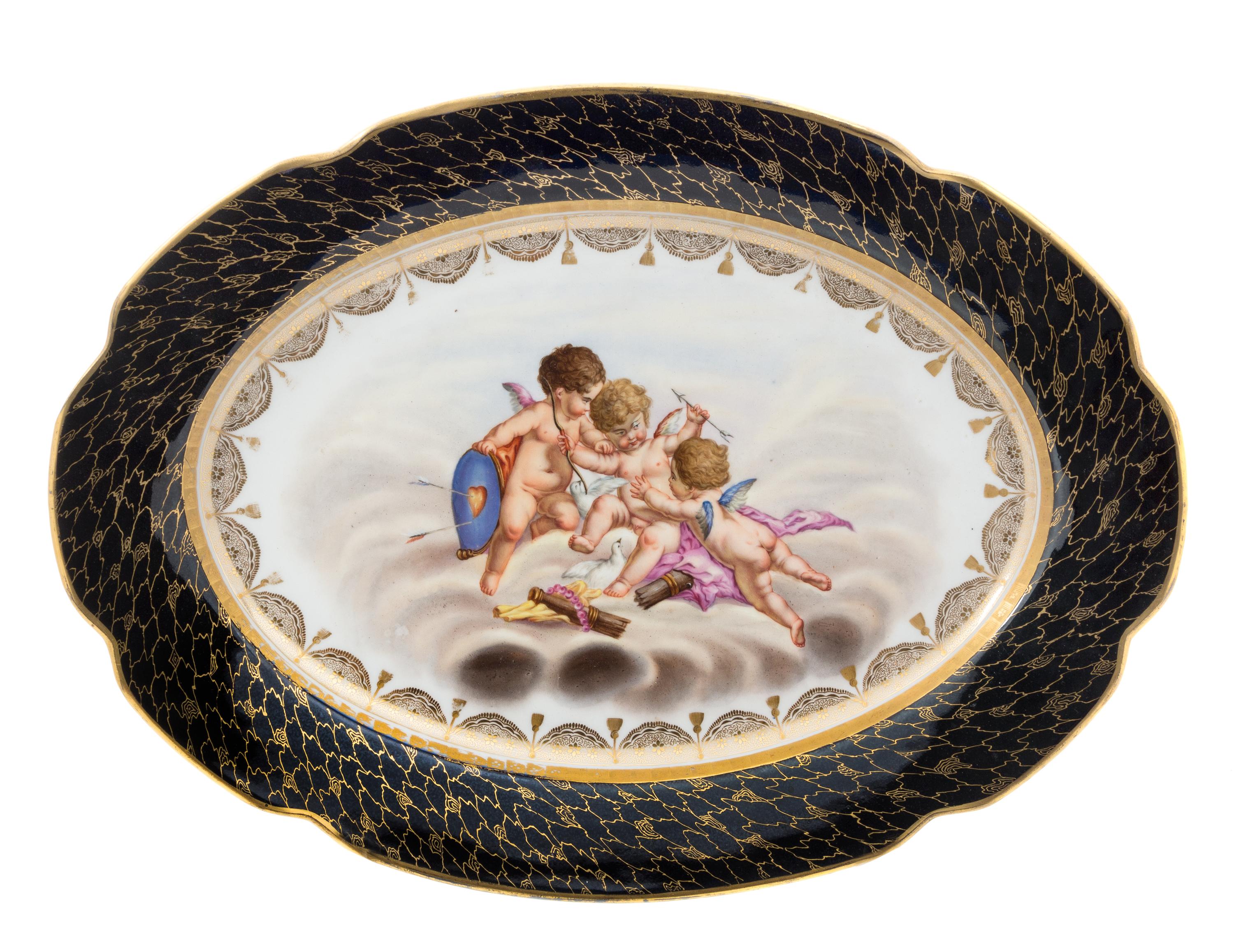 A Continental Porcelain Platter Width 22 3/4 inches.
