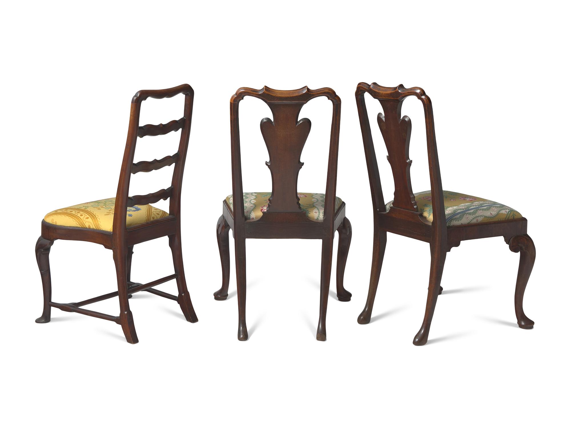 A Group of Three George II Carved and Veneered Walnut and Elm Side Chairs