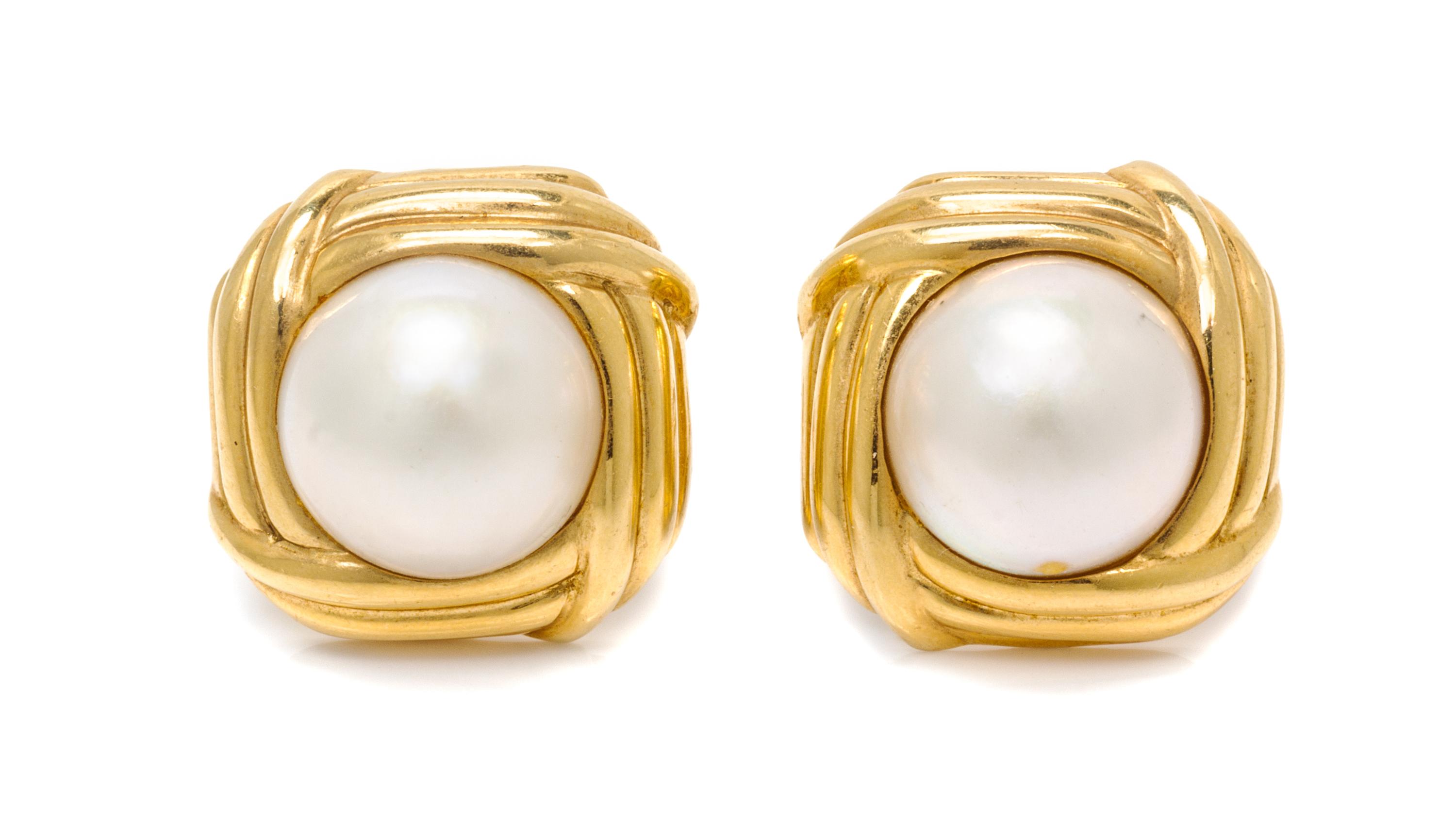 A Pair of 18 Karat Yellow Gold and Mabe Pearl Earclips, 13.30 dwts.