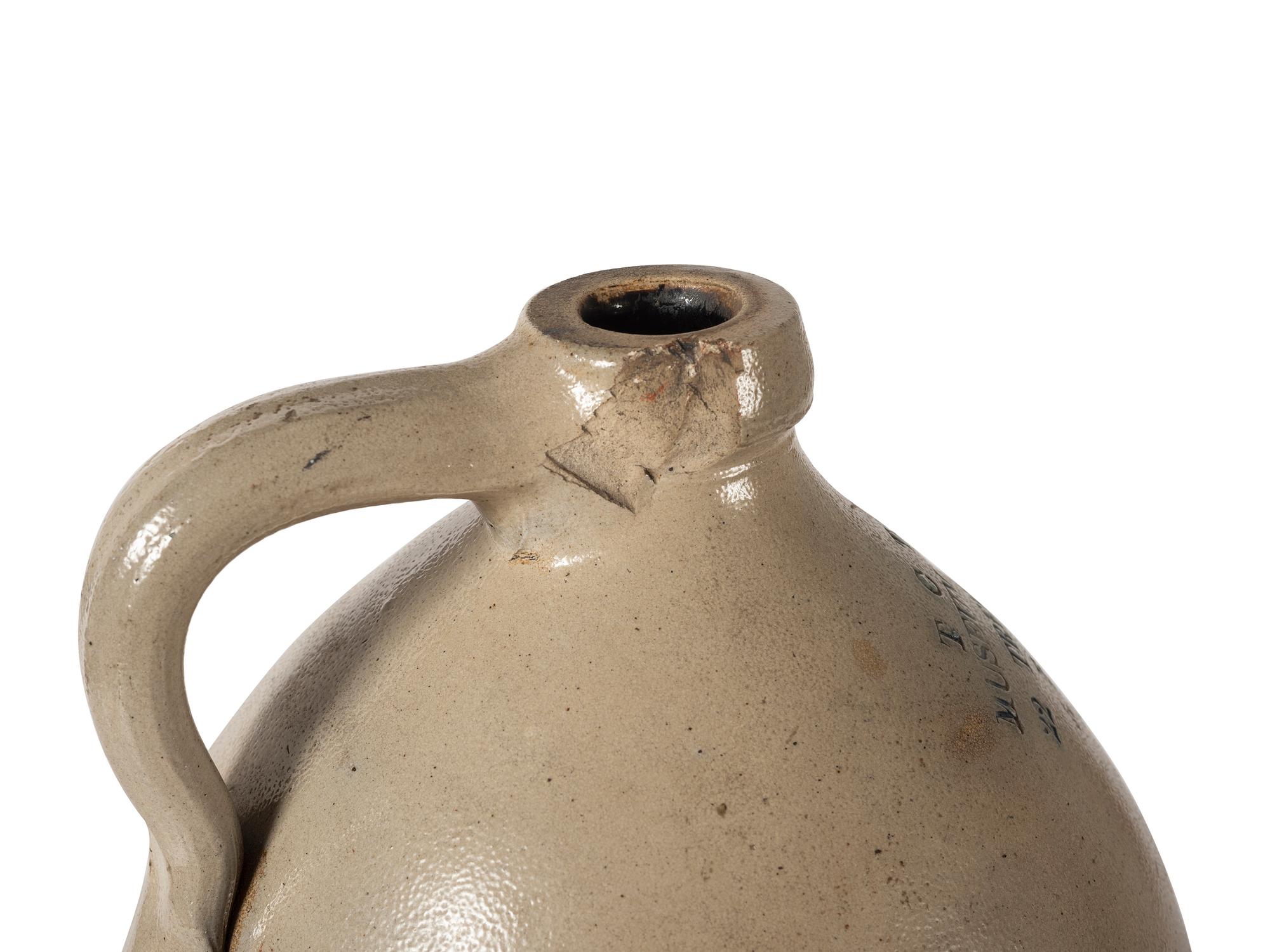 A Two-Gallon Cobalt Decorated Stoneware Advertising Jug