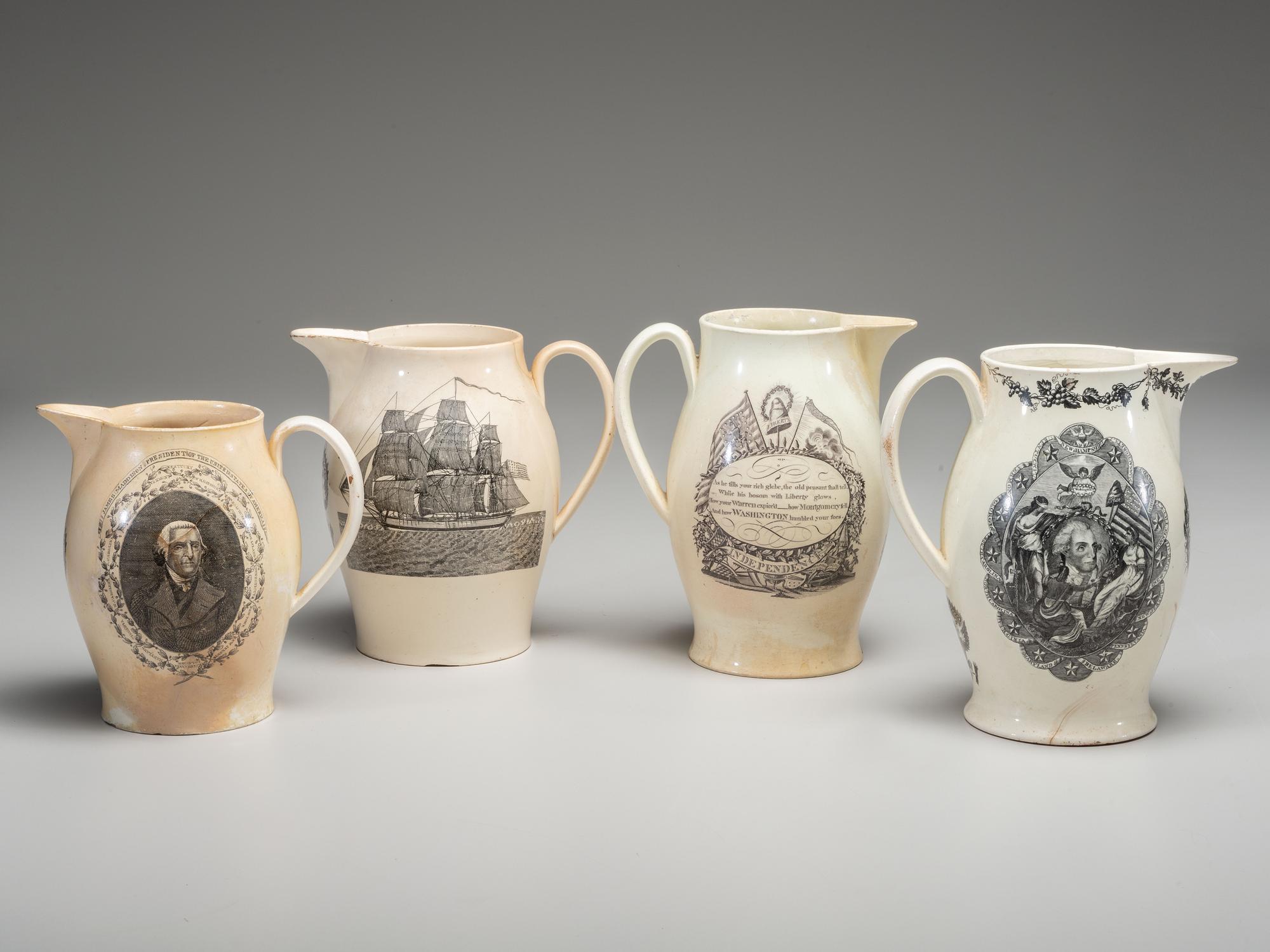 A Wedgwood Britannia and Etruria Panel and Nautical Creamware Pitchers