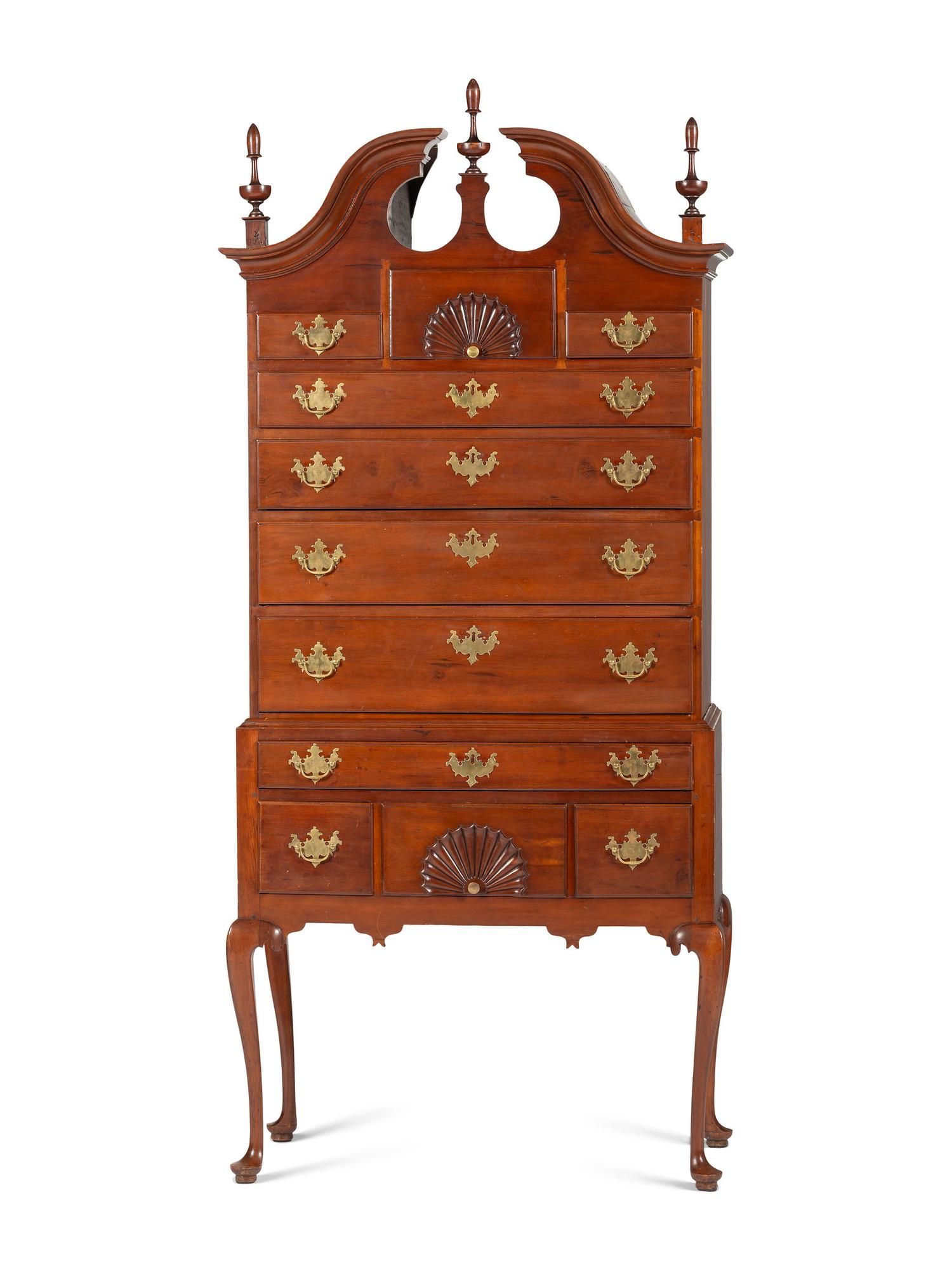A Queen Anne Fan-Carved Cherrywood Bonnet-Top High Chest