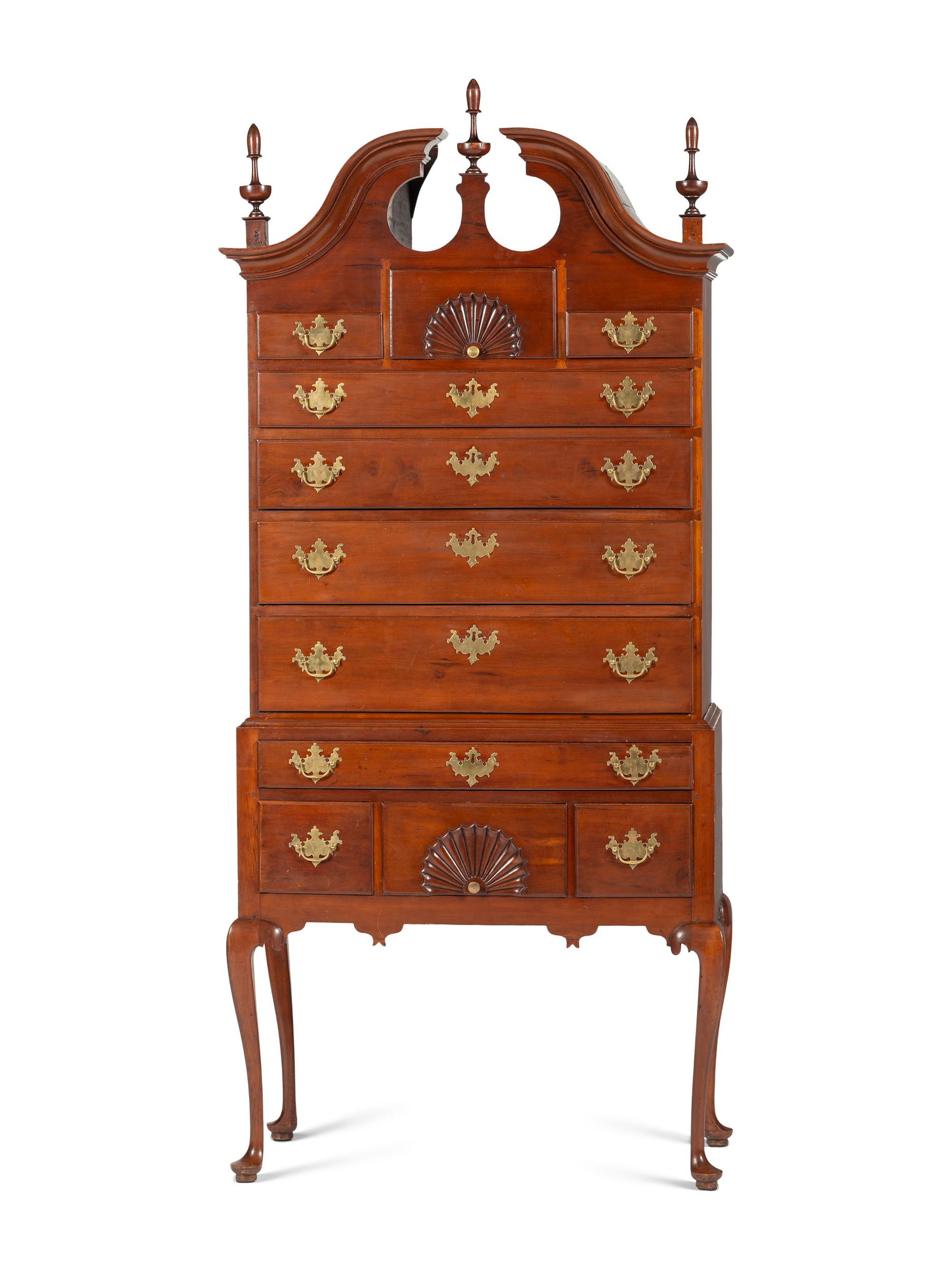 A Queen Anne Fan-Carved Cherrywood Bonnet-Top High Chest