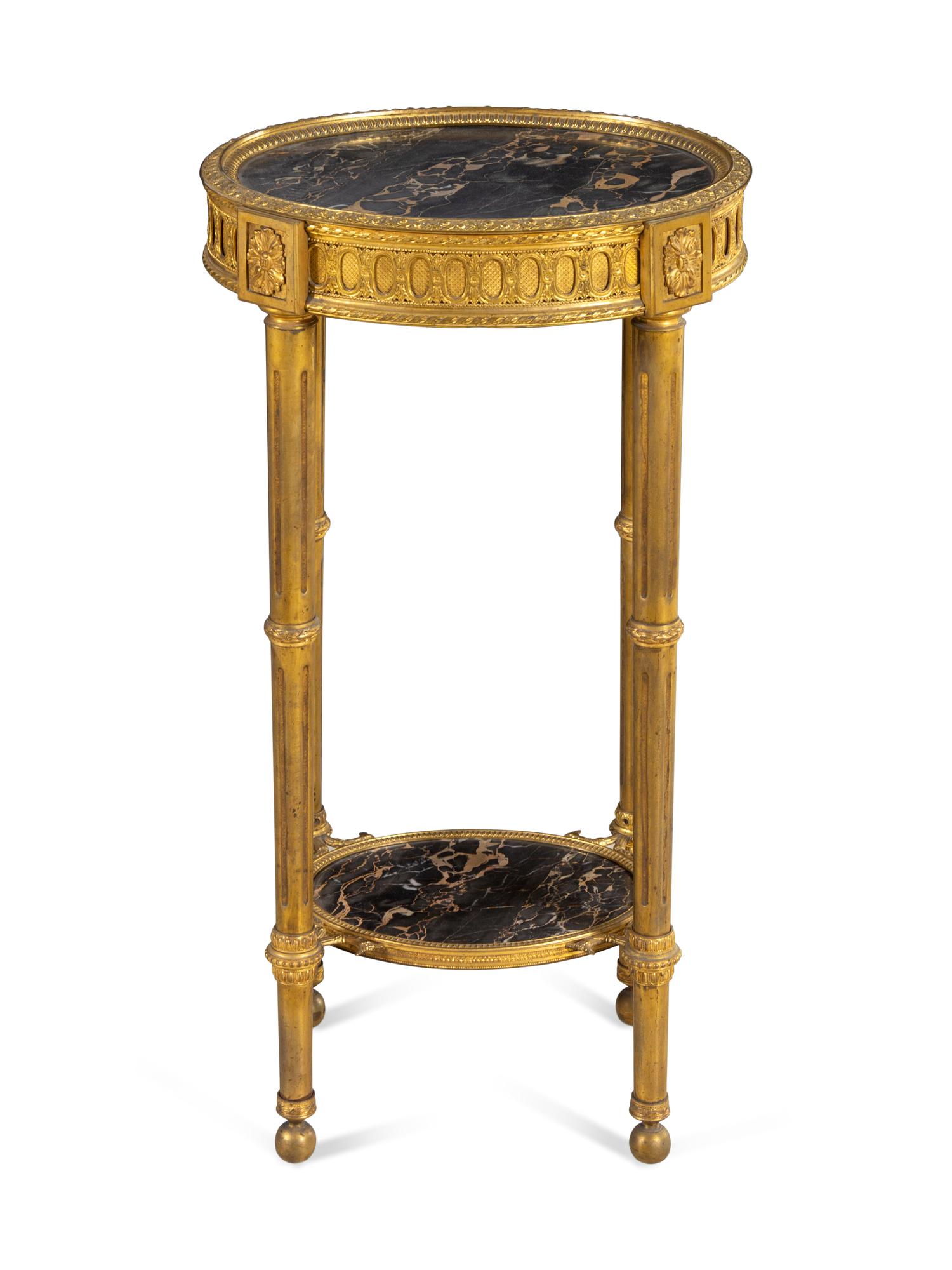 A Louis XVI Style Gilt Bronze and Marble-Inset Table