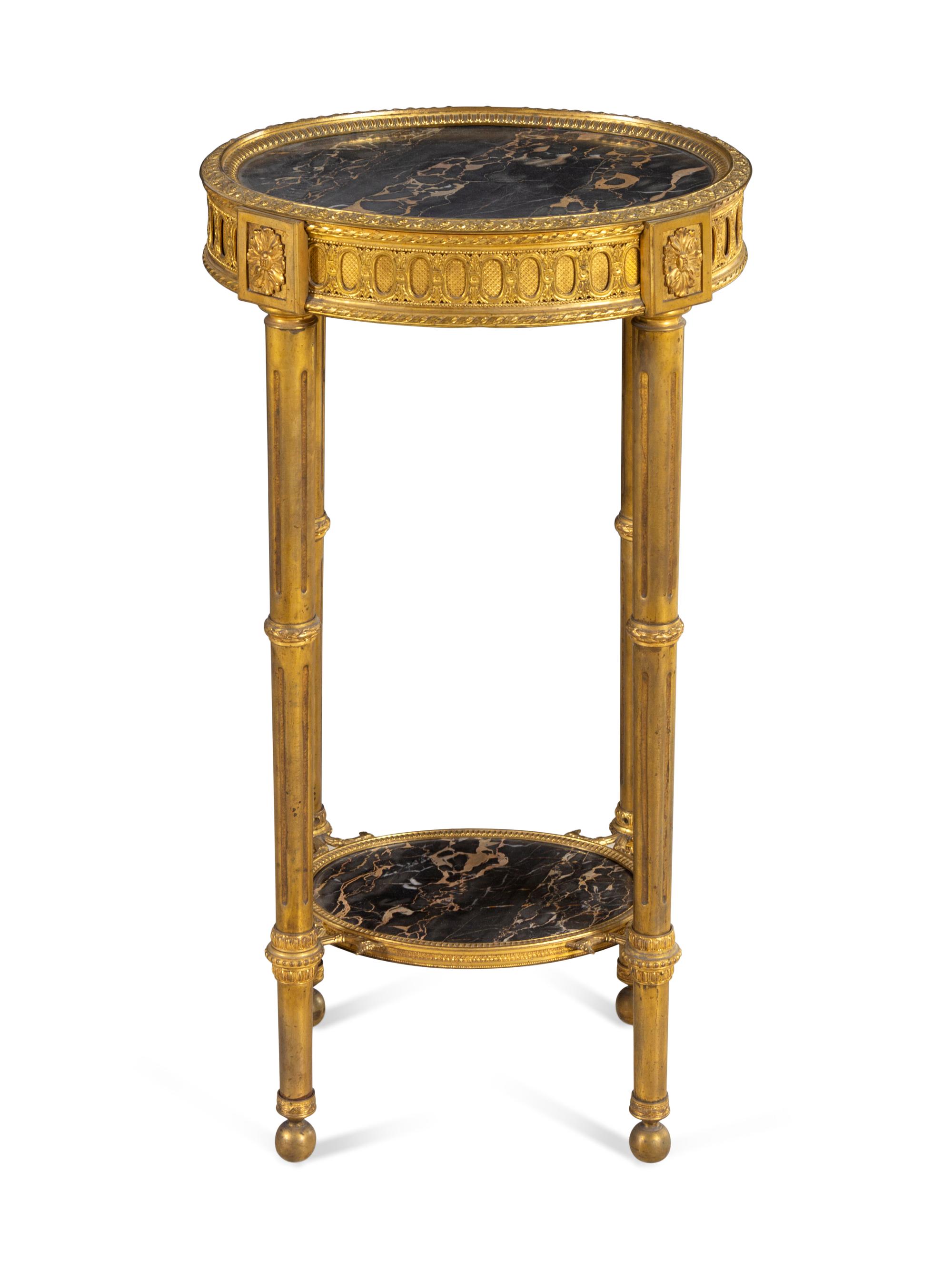 A Louis XVI Style Gilt Bronze and Marble-Inset Table