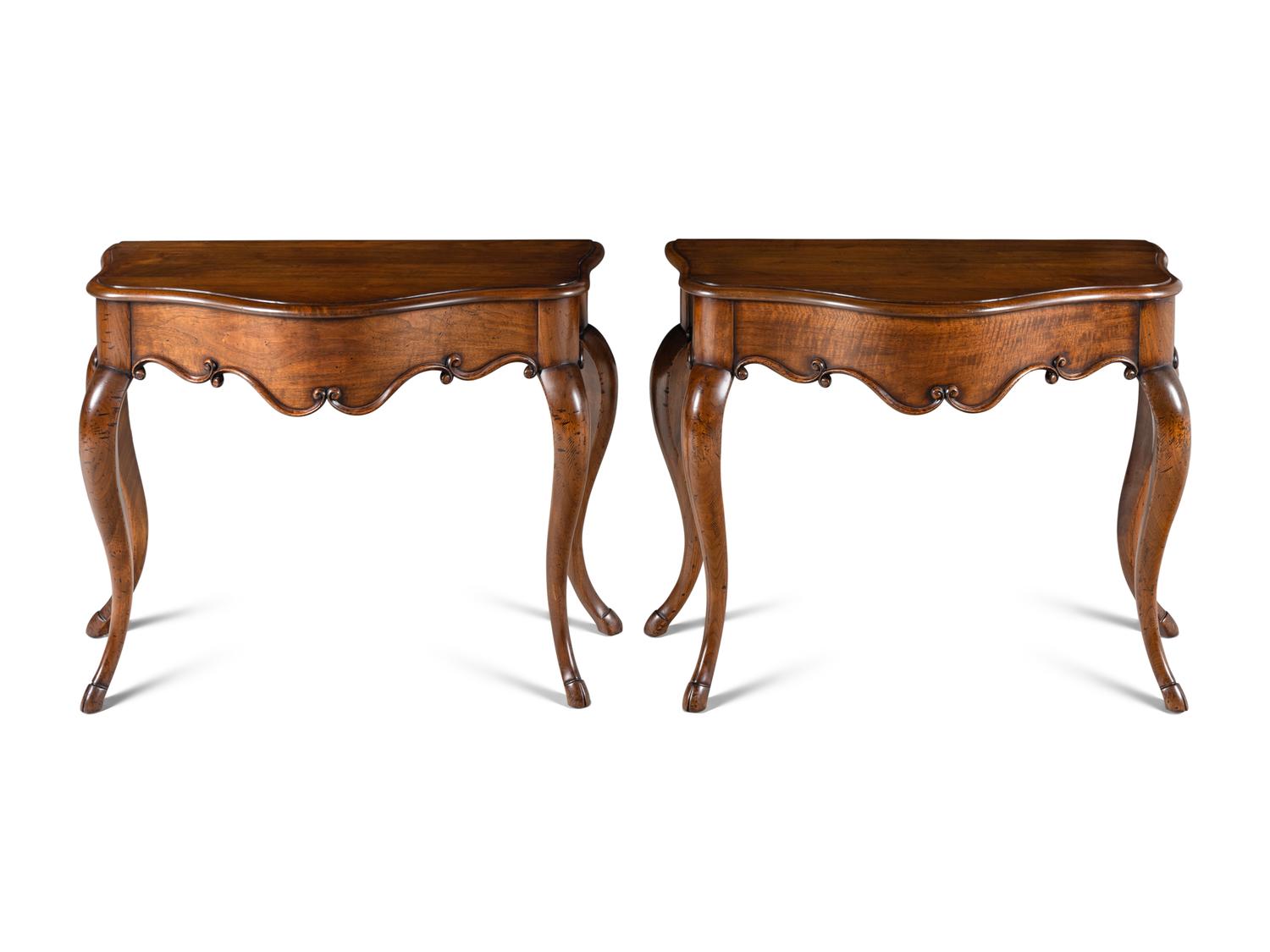 A Pair of Rococo Style Serpentine Console Tables