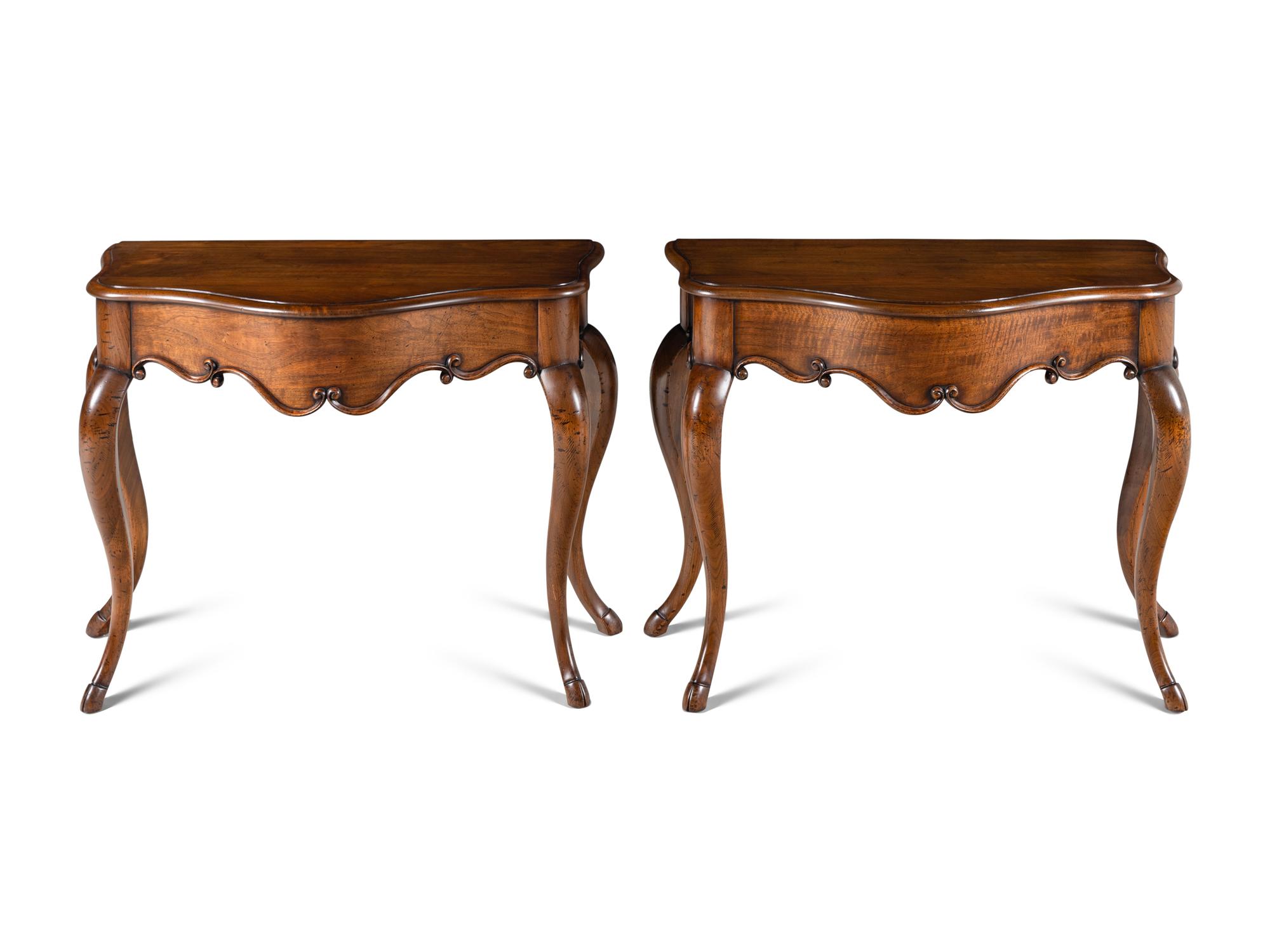 A Pair of Rococo Style Serpentine Console Tables
