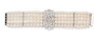 A Platinum, 18 Karat White Gold, Diamond, and Multi Strand Cultured Pearl Bracelet, 35.80 dwts.