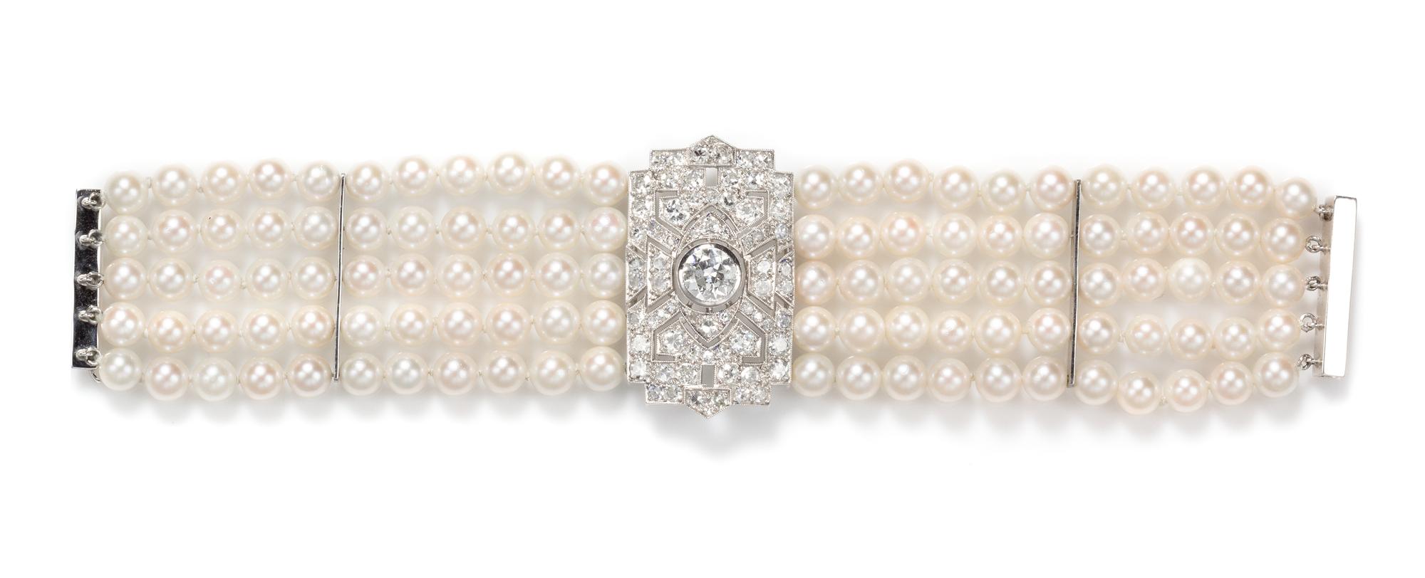 A Platinum, 18 Karat White Gold, Diamond, and Multi Strand Cultured Pearl Bracelet, 35.80 dwts.