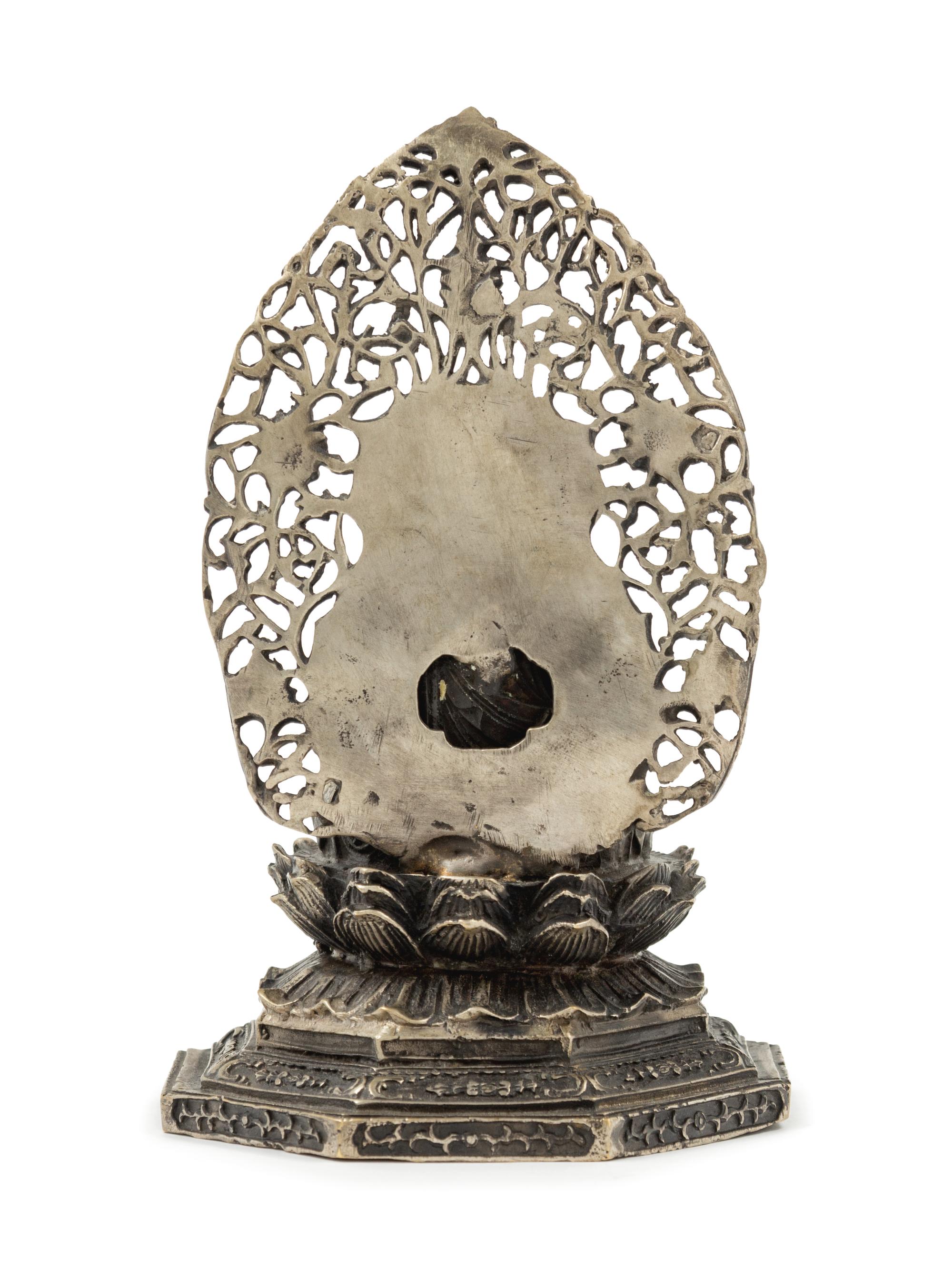 A Japanese Bronze Figure of Seated Buddha