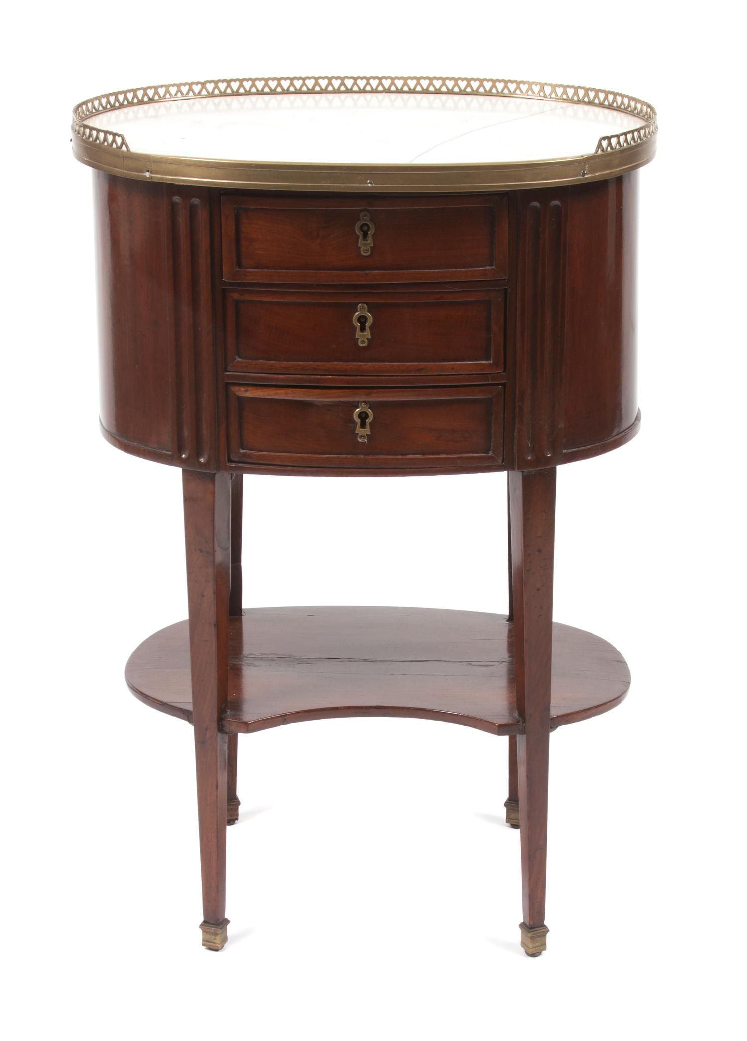 A French Brass Mounted Mahogany Table en Chiffonniere Height 28 1/4 x width 19 x depth 13 inches.