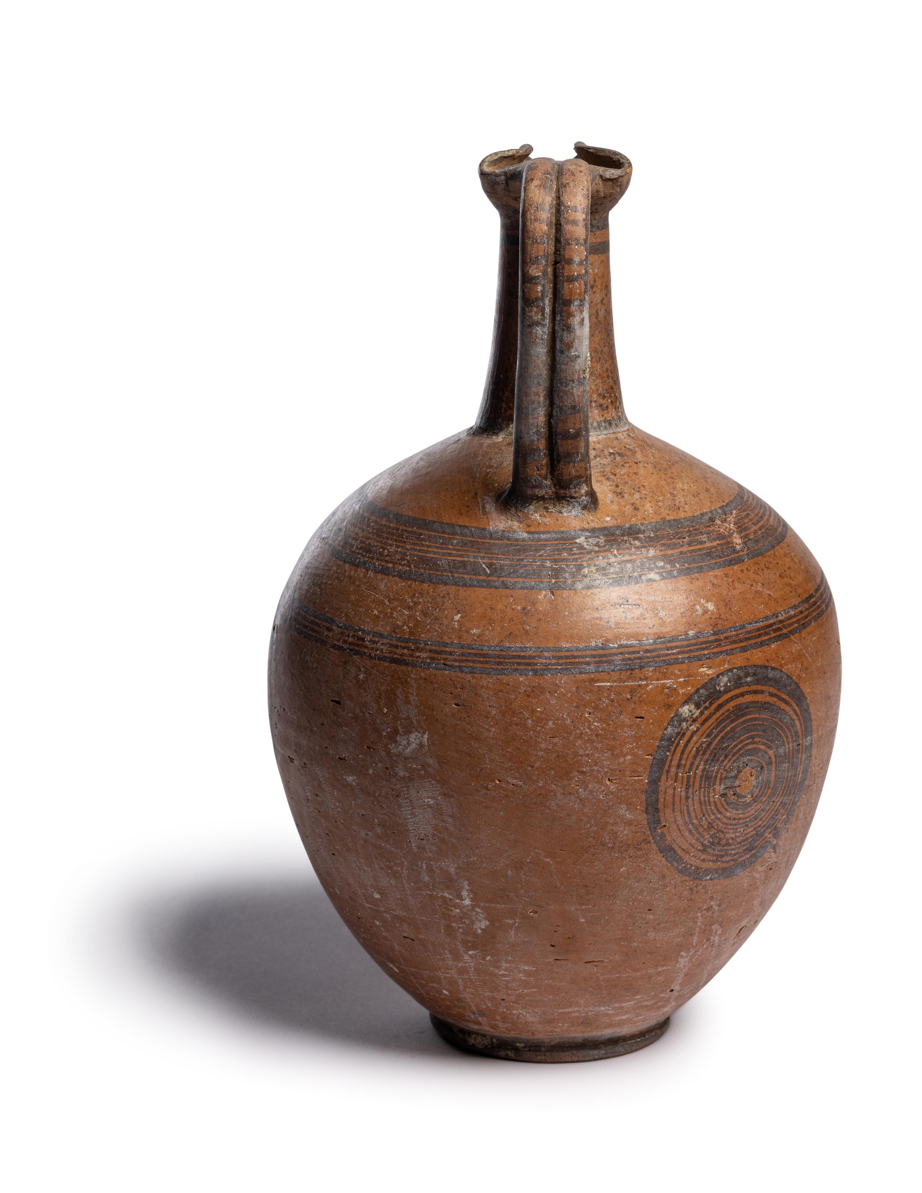 A Cypriot Black‑on‑Red II Ware Jug