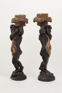 A Pair of Gilt and Patinated Bronze Figures of Cherubs
