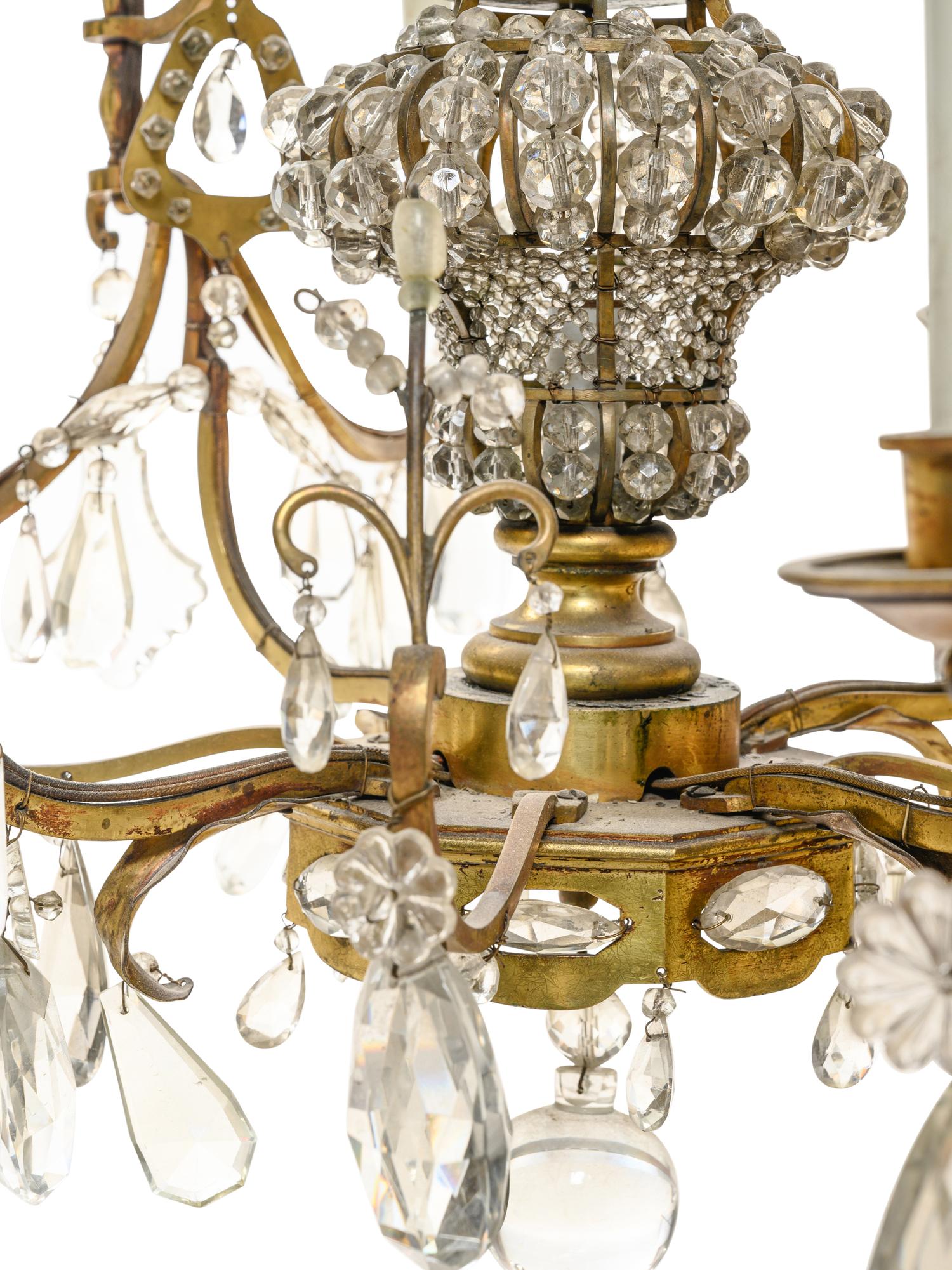 A Pair of French Gilt Bronze and Glass-Beaded Twelve-Light Chandeliers