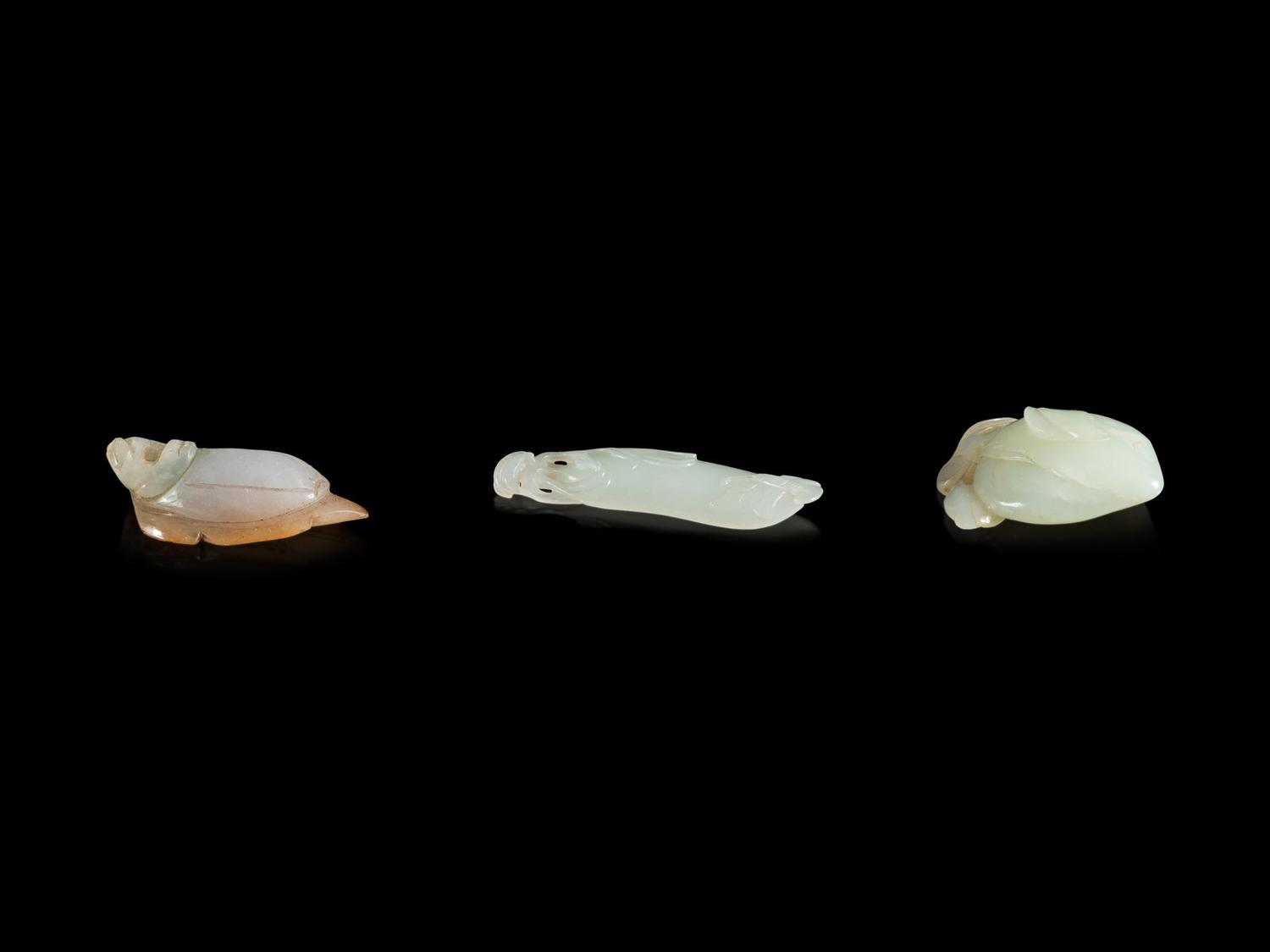 Three Carved Jade and Jadeite Fruit and Melon-Form Pendants