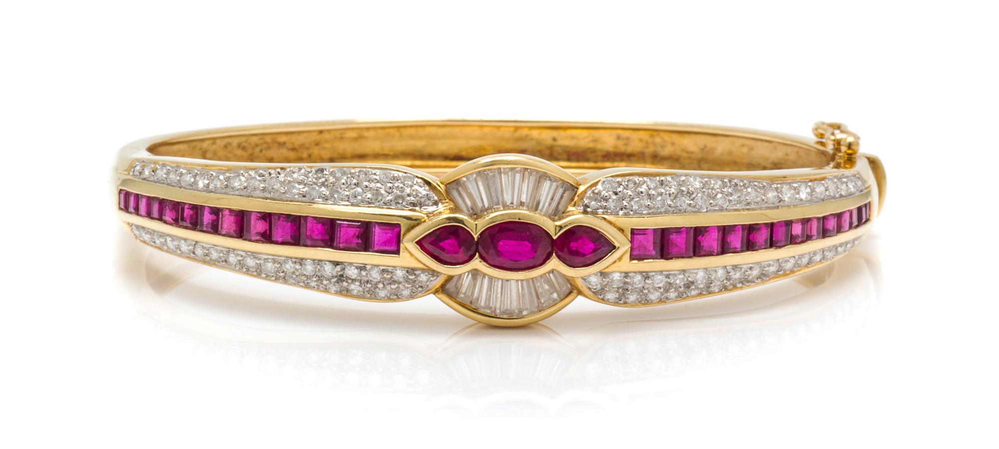 An 18 Karat Yellow Gold, Ruby and Diamond Bangle Bracelet, 19.00 dwts.