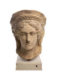 An Etruscan Terra Cotta Votive Head of a Veiled Woman