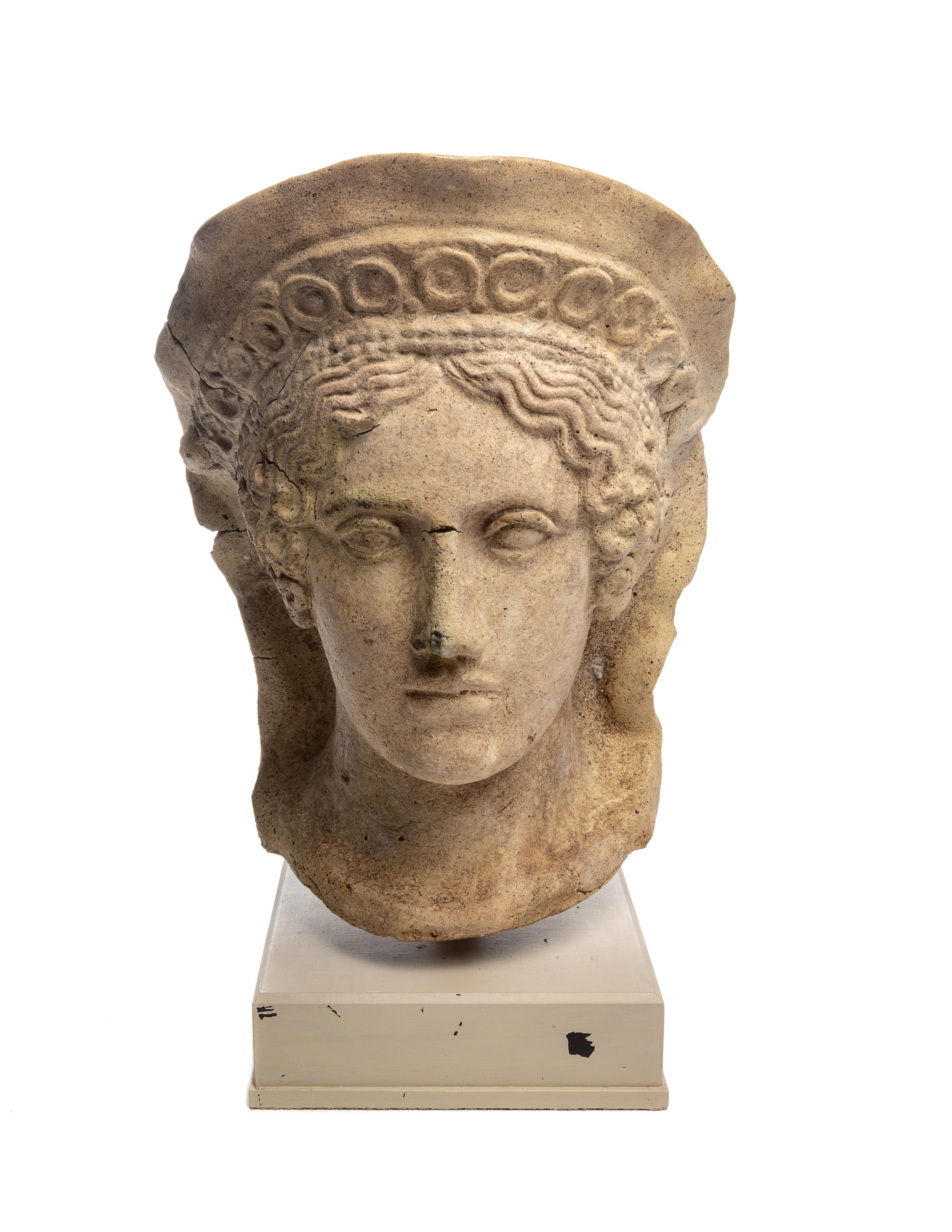 An Etruscan Terra Cotta Votive Head of a Veiled Woman