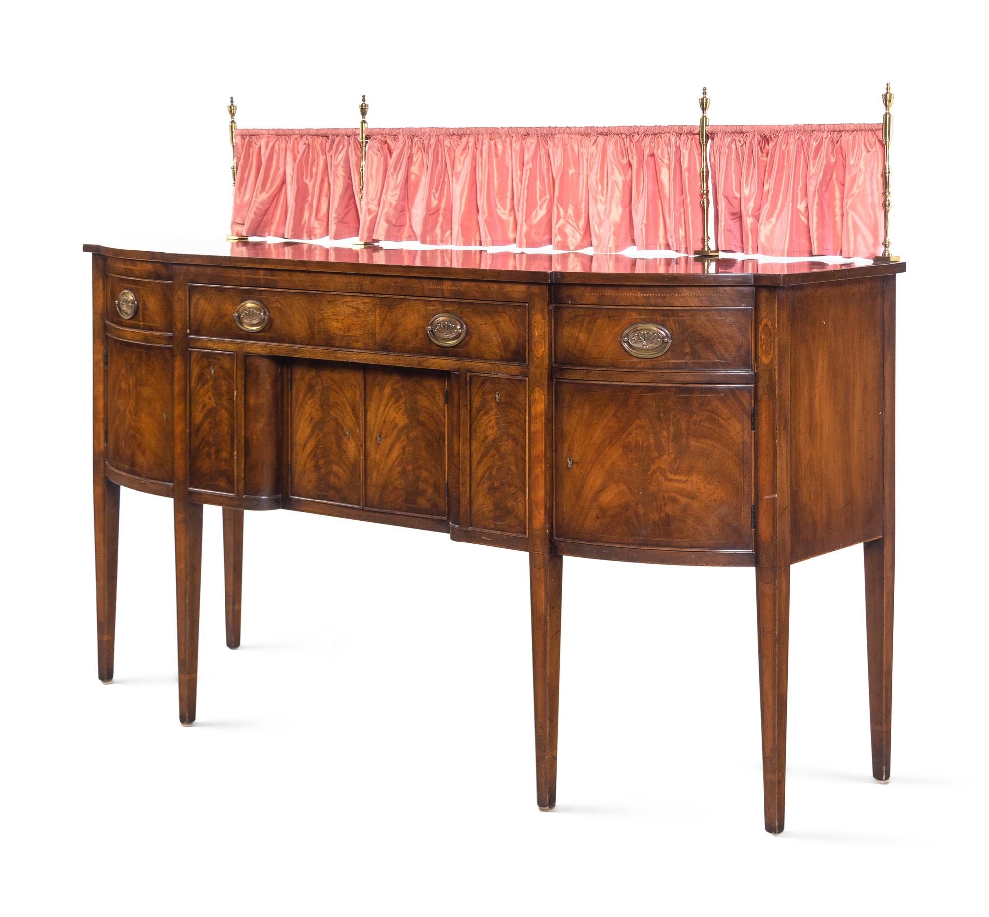 A Regency Style Mahogany Sideboard with Silk Drape on a Brass Gallery