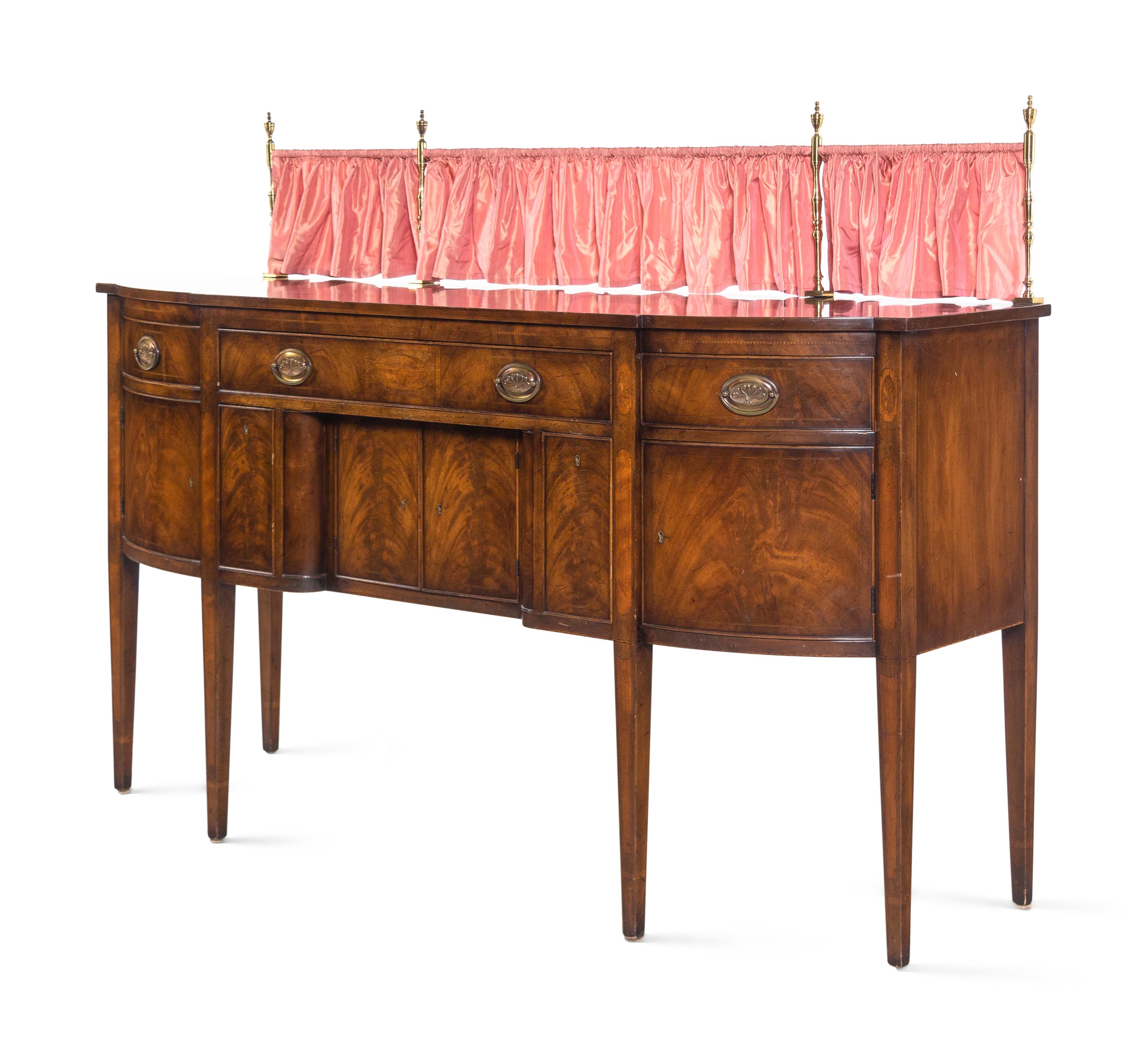 A Regency Style Mahogany Sideboard with Silk Drape on a Brass Gallery